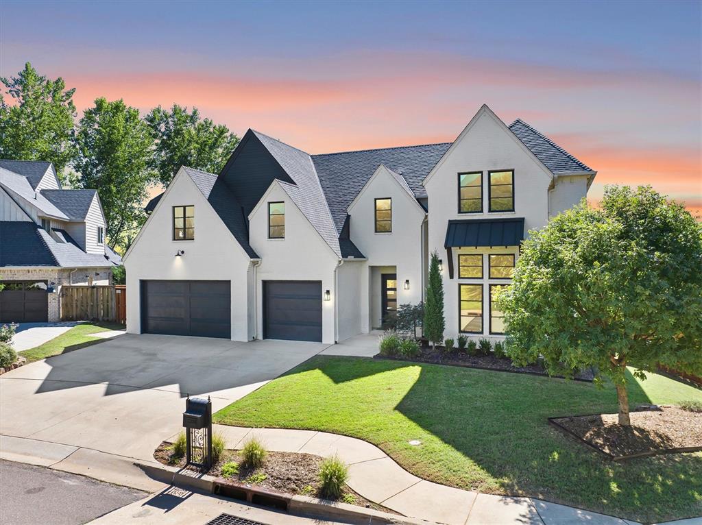 Discover a fresh take on modern luxury at 2208 Old Creek, ideally situated in the prestigious Iron Horse Ranch community. At the heart of the home, the kitchen brings a modern design to life with open shelving, wood flooring, quartz surfaces, and a striking waterfall island offering generous space for gathering. The adjoining butler’s pantry elevates both entertaining & everyday living with double ovens, a walk in pantry, and second sink. The dining area provides plenty of room for memorable dinners & celebrations. A secondary bedroom with private ensuite & a convenient powder bath complete this area of the home. The luxorious primary suite is a private retreat, beautifully appointed with decorative wood ceiling beams that add warmth & architectural character. Double doors open to a spa inspired ensuite bath featuring two separate vanities, a dedicated dressing vanity, and an elegant freestanding soaking tub creating a serene, sophisticated space designed for both comfort & indulgence. The mudroom features mud bench & flows into an oversized laundry room with direct connection to the primary suite. Upstairs offers three additional bedrooms, one with a private ensuite & two sharing a true Jack & Jill bath. A bonus/game room & cozy reading nook create inviting spaces for movie nights, play, study, or relaxing. Recently refreshed throughout, the home features all new interior paint, carpet, toilets & plumbing fixtures, light fixtures, interior doors, door/cabinet hardware, along with select updated tile & wood flooring. Outdoor living is equally impressive with an expansive covered patio designed for year round enjoyment. A striking outdoor fireplace creates an inviting focal point, while the built in grill makes the space ideal for effortless entertaining, al fresco dining, and relaxed evenings at home.A rare combination of modern sophistication, generous living spaces, and extensive updates all within one of Edmond’s most sought after luxury communities.Welcome Home!