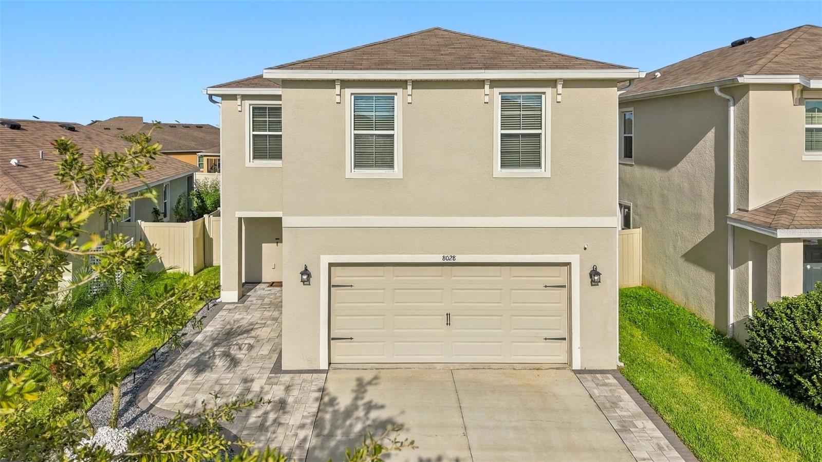 Exterior listing photograph: Updated Home with a Fenced Backyard in Wesley Chapel