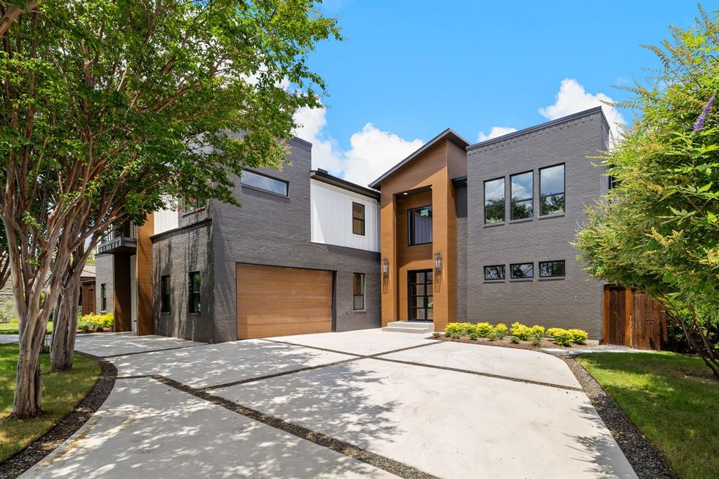 Stunning new-construction custom home, offering 5 bedrooms and 5 full baths plus 1 half bath with a refined living space. Located on a 0.37-acre lot in the coveted Hillcrest Forest-Northaven Meadows area. Features include soaring ceilings with wood-beam accents, three fireplaces, light oak wood floors throughout, chef’s kitchen with marble countertops, custom cabinetry, high-end Dacor appliances, butler pantry and hidden door pantry. The primary suite impresses with a dramatic two-story walk-in closet and spa-style bath. Upstairs includes a glam room with glass closet and double island, plus a bonus room above the four-car garage perfect for a game room or guest quarters. Exterior details include board & batten siding with brick, covered patio and side-circular driveway.