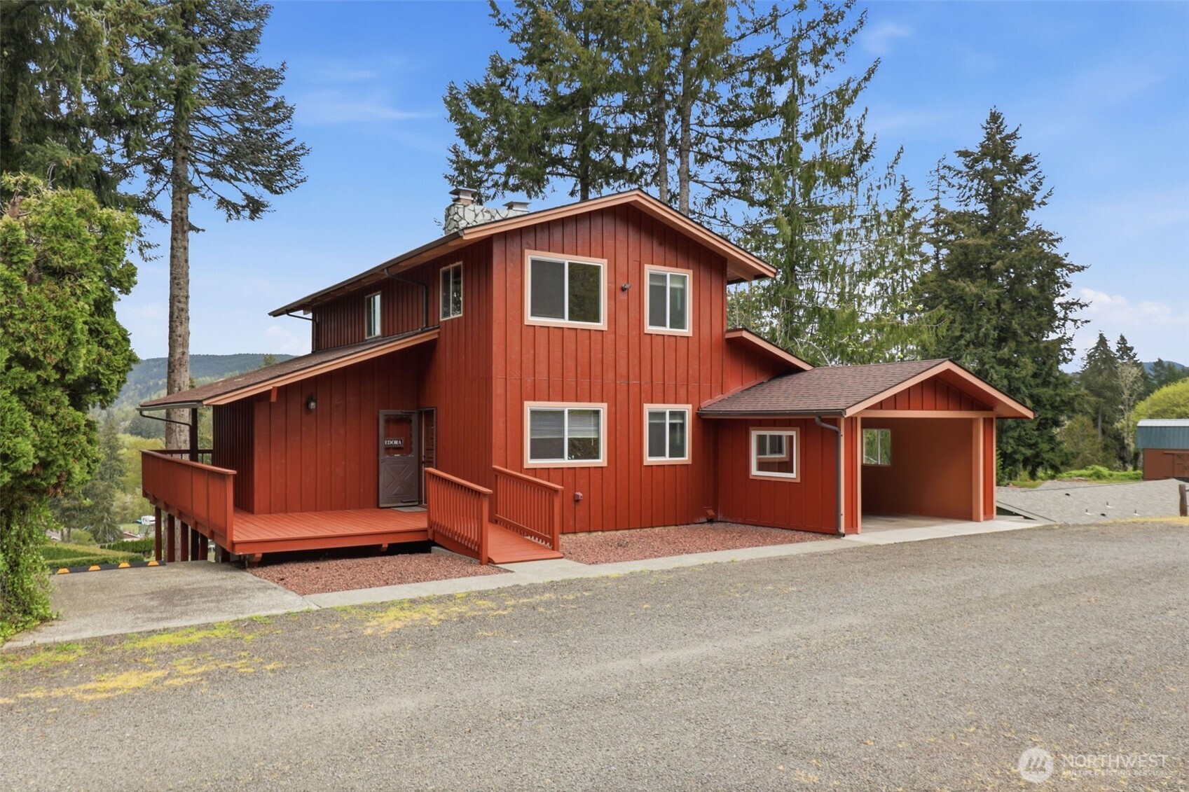 This is your opportunity to own a charming, turn-key home in the desirable Mayfield Village area, where peaceful surroundings and lake living come together. Perched above rolling hills and framed by evergreens, the home captures sweeping territorial and lake views, creating a true retreat. Inside, you’ll find warm wood finishes, exposed beams, and expansive windows that highlight the scenery. The main living area features vaulted ceilings and a stunning Montana stone fireplace, offering a cozy yet open feel. Large sliders lead to expansive decks—perfect for entertaining or relaxing. The flexible layout includes multiple living spaces, with a lower level featuring its own fireplace, ideal for guests or a private retreat. The kitchen is functional with ample cabinetry and great flow. Major updates provide peace of mind, including updated electrical and plumbing, a new roof (2025), updated flooring, fresh exterior paint, and rebuilt decks. Outdoor covered and open deck spaces extend living areas and connect seamlessly with nature. Enjoy privacy just minutes from Mayfield Lake, with easy access to a marina and boat launch. Whether a full-time home, weekend getaway, or investment, this property offers exceptional setting, character, and livability.