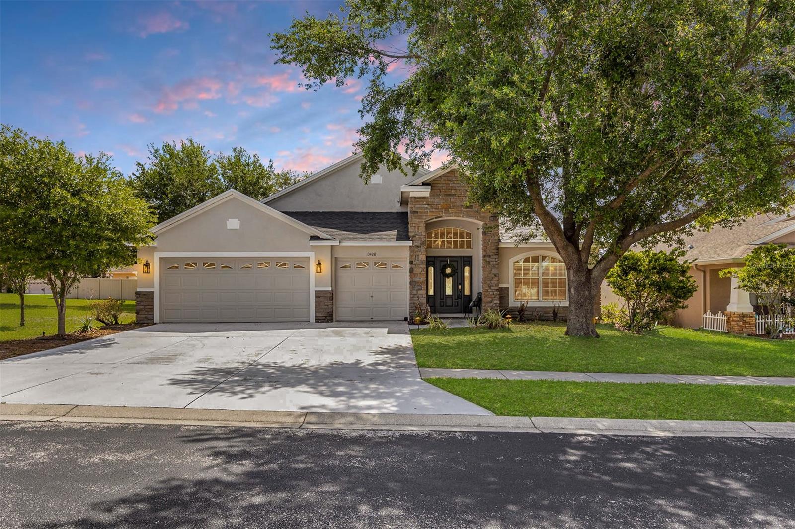Make sure to check out the Virtual Tour for a 3D Model w/ Walkthrough, Floor Plan w/ Measurements, Video, & more! Space, style, and flexibility all wrapped into one beautifully maintained package, 13428 Mandalay Place checks boxes most homes can only dream about. Located on a spacious .31 acre corner lot inside the gated Sterling Hill community, this home offers 4 bedrooms, 3 full bathrooms, TWO oversized primary suites, a dedicated office, and a 3 car garage across 2,653 square feet of living space.  With a New Roof and AC both installed in 2023, the home also brings peace of mind to match the space and flexibility that comes with soaring ceilings, expansive living areas, and a layout designed for real life, ready for growing families, guests, or multi generational living.Inside, the vaulted ceilings and open spaces immediately make the home feel airy and inviting. The formal living and dining areas create an impressive first impression while still feeling comfortable. The office or flex room near the front entry gives you endless possibilities including a home office, playroom, fitness room, or even a potential fifth bedroom setup. Luxury vinyl flooring throughout the main living spaces adds a clean modern look that ties everything together beautifully.The kitchen sits at the center of the home and was built for functionality and gathering. Endless cabinetry, generous counter space, a breakfast bar, and an oversized breakfast nook flow seamlessly into the family room, creating a setup that keeps everyone connected. The family room offers plenty of room for furniture, movie nights, and entertaining.One of the standout features is the rare dual primary suite layout. The main primary suite offers a spacious retreat with room for a sitting area, and a massive ensuite bath complete with dual vanities, garden tub, separate walk in shower, private water closet, and an oversized walk in closet. The second primary bedroom creates incredible flexibility for anyone who appreciates a little extra privacy.The additional bedrooms are generously sized, and the thoughtful split floor plan keeps the home flowing comfortably for both everyday living and entertaining. Even the laundry room and garage spaces feel oversized and practical, giving you storage space that actually makes a difference.Step outside and the Florida lifestyle fully kicks in. The oversized screened lanai and expansive paver patio create the perfect setup for outdoor dining, relaxing evenings, and backyard gatherings beneath the mature shade trees. The fully fenced backyard offers privacy, room for pets to roam, and direct access to a pool bath already in place if adding a future pool is on the wish list. The corner lot adds extra curb appeal, while the oversized 3 car garage leaves plenty of room for vehicles, storage, and golf carts.Sterling Hills offers gated access, resort style pools, fitness centers, playgrounds, splash pad, tennis courts, basketball courts, walking trails, volleyball courts, and a huge dog park. The Suncoast Parkway is approximately 15 minutes away for an easy Tampa commute, US 19 is around 20 minutes away, and Weeki Wachee Springs State Park is roughly 15 minutes from home. While shopping, dining, grocery stores, and golf courses are all nearby.Homes with this much space, flexibility, and functionality are hard to come by. Schedule your private showing before someone else decides this is exactly where their next chapter belongs.