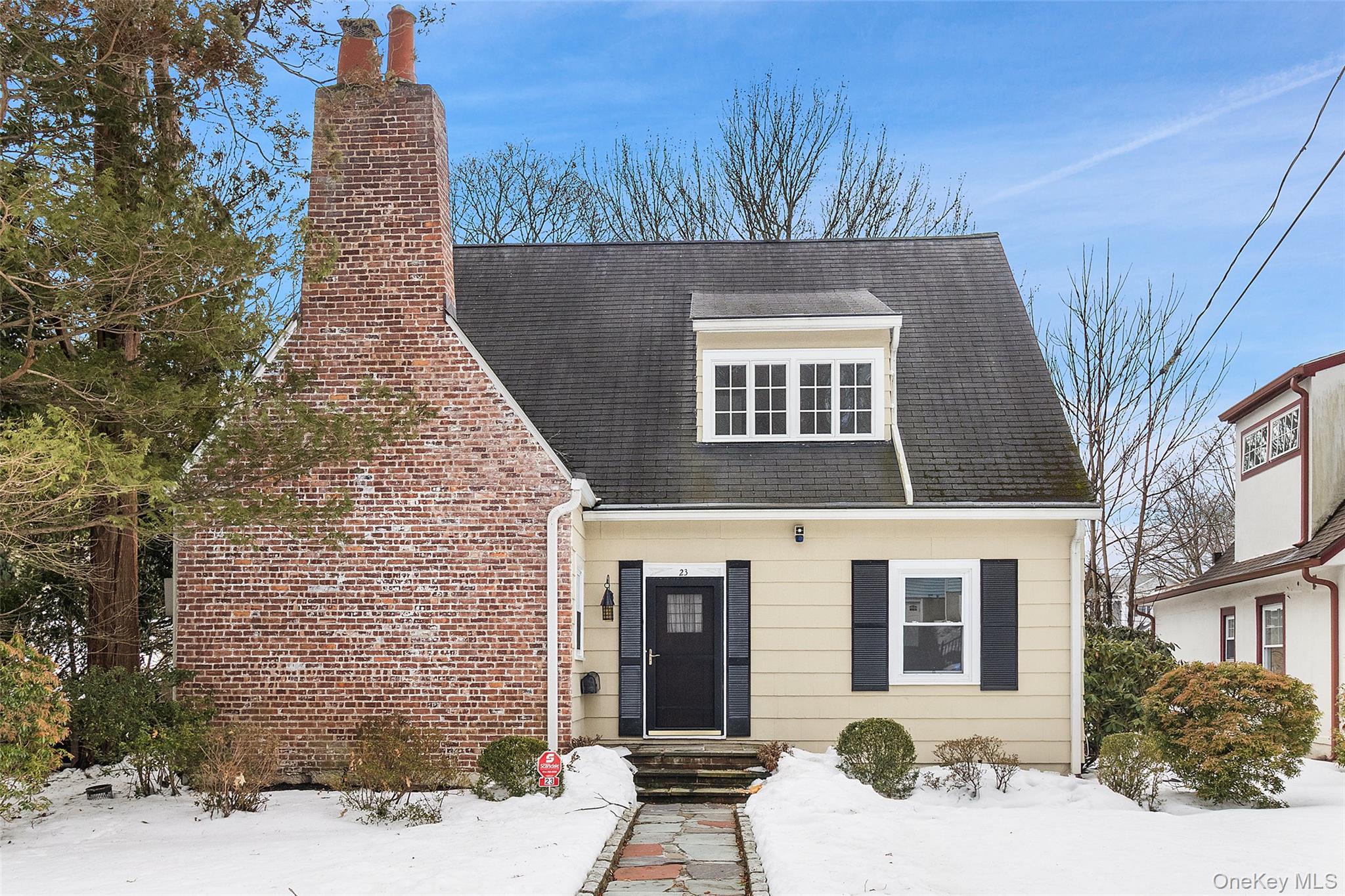 Situated in the sought-after Hamlet of Westminster Ridge, this three-bedroom, two-bath home offers timeless warmth and an inviting atmosphere. This home is being sold as is. Hardwood floors run throughout, and the freshly painted interior provides a bright, clean backdrop ready for your personal touch. A charming wood-burning fireplace anchors the living area, adding comfort and character to the space.While the front of the property sits along a classic residential street, the rear opens onto a quiet cul-de-sac, offering enhanced privacy and convenient access to the garage. The backyard provides usable outdoor space ideal for relaxing, entertaining, or enjoying everyday outdoor living.Residents of Westminster Ridge may choose to join the Lakenridge Club, where membership offers access to Todds Pond with lifeguards, a diving raft and slide, playground, picnic areas with fire pits, basketball courts, canoeing, and more—fostering a vibrant sense of community. Ideally located approximately 1.67 miles from the Metro-North station and close to shopping, dining, and the scenic Kensico Dam Plaza, this home presents an excellent opportunity to enjoy comfort, character, and convenience in one of White Plains’ most beloved enclaves.