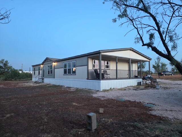 GREAT SPOT FOR A HORSE RANCH WITH 18.34 ACRES IN GREEN WOOD SCHOOL DISTRICT WITH A 3 YEAR OLD DBL WIDE HOME THAT HAS 4 BEDROOMS AND 2 BATHS. SEPTIC WAS JUST INSTALLED. WELL HAS 20 GPM RECENTLY TESTED BY JR'S WATER WELL SERVICE. LIVE IN THE DBL WIDE WHILE YOU BUILD YOUR DREAM HOME. PLENTY OF ROOM FOR HORSES WHO CAN BE IN THE VERY TALL MESQUITE TREES IN THE SHADE. THIS IS A SPECIAL PROPERTY WITH A NATURE PRESERVE FEEL TO IT. VERY PEACEFUL. IF YOU HAVE KIDS THAT WANT TO ROAM THIS IS THE PLACE FOR YOU. THIS PROPERTY HAS ALREADY BEEN SUBDIVIDED SO LIVE IN THE ENTIRE 18 ACRES OR SELL SOME LOTS.