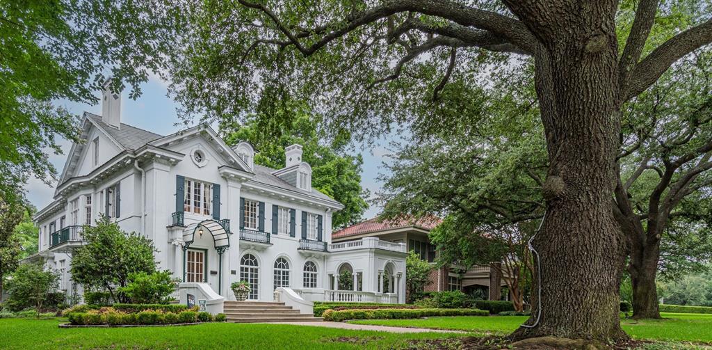 Prominently situated on a coveted corner lot along the prestigious Swiss Ave. A distinguished estate—1 of only 5 designated Dallas Historical Landmarks. Stands as a testament to early 20th-century grandeur & architectural brilliance. Designed in 1916 by renowned Hal Thomson, the residence marries the historic elegance that marked Mr. Thomson's attention to detail with contemporary luxury. The main house with a grand great room with Venetian plaster walls & sunroom over looking a secret garden. Elegant fml. dining rm has original chandeliers & sconces, 4 spacious bedrooms, 4 full baths, 2 half baths & library. Interior is adorned with soaring ceilings, oak hardwoods, dentate ceiling crown molding, handcrafted fireplaces & many steel casement windows letting in natural light, all culminating elegance & sophistication. Gourmet kitchen with 2 sinks, 2 dw, Wolf range with double ovens, microwave, warming drawer, quartzite counters, hidden sect desk, walk-in pantry, glass-front cabinets with lighting, ice maker, large & mini refrig & more. Primary suite is a private sanctuary. Bath features heated floors, luxury duo shower with rain & sauna features & heated tub. Sonos system serves many rooms & primary suite has separate sound for the shower. Huge media rm. equipped with mini fridge, microwave & theater equip. An elevator services the 1st & 2nd floor. Exterior is equally captivating with extensive landscaping, side Loggia patio, grand front walkway lit by tree-mounted spotlights, & a matching chicken coop providing fresh eggs daily. Backyard oasis has sparkling pool, hot tub, garden beds, lighting & an approx. 800-sq. ft. carriage guest house with the 1916 telephone & additional space not in the main sq. ft. Dog shower in mudroom & outdoor shower are adjacent to the pool area. This exceptional estate embodies the perfect blend of historical significance and modern comfort, offering a rare opportunity to own a piece of Dallas's rich architectural heritage!