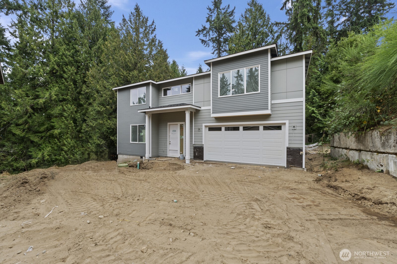 New Construction home in the wonderful city Lake Forest Park, this home is apart of the AMAZING Lake Forest Park Civic Club with tons of perks and amenities on the water. This 5 bedrooms 3 bathroom home includes, 1 bedroom on the main floor along with a full bath and 4 upstairs including a must see primary suite. Including 2 walkin closests, a massive 5 peice bathroom and a large private primary suite with an abndance of light. The other 3 bedrooms upstairs all have walkin closets along with a large laundry on the 2nd floor. The main floor of the home is all open concept living with the kitchen, dining and living room flowing to a walk out patio for ease of indoor/outdoor living. Come check out this New Construction home!!