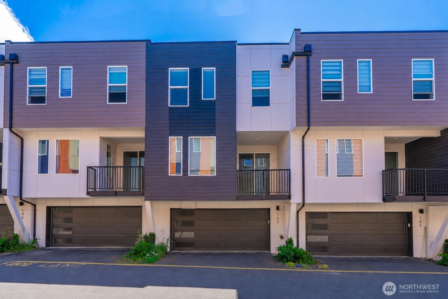 Welcome to this 2023 townhome in the heart of Burien! Step inside to an airy open-concept layout where 9-foot ceilings, oversized windows & Luxury Vinyl Plank flooring create a bright, modern atmosphere. The gourmet Kitchen is a chef’s dream with quartz countertops, full-height backsplash, soft-close cabinets, stainless-steel appliances & a generous center island with an integrated trash cabinet, perfect for hosting friends or enjoying quiet dinners at home.    Upstairs, retreat to your private Primary Suite with a spa Bath, while additional bedrooms offer flexible space for guests, hobbies or a home office. A covered deck balcony just off the center living area allows for year-round entertaining & relaxation. Practical touches like a private 2-car garage, interior sprinklers, and a tankless water heater ensure peace of mind.    Just steps outside, enjoy the community playground, picnic area, basketball court, BBQ grills & guest parking. Commuters will love the quick access to major freeways & Sea-Tac Airport. Local schools, Southcenter Mall, downtown Burien, Seattle, Bellevue, & Tacoma are just minutes away. Don’t miss this opportunity to own a stylish, low-maintenance home that offers both comfort & convenience!