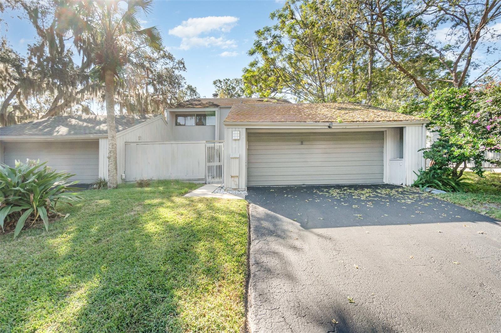 Assumable FHA mortgage available — discover this beautifully maintained 3-bed, 3-bath home in The Springs – Live Oak Village community. Enjoy an open floor plan with vaulted ceilings, solid-surface counters, stainless-steel appliances, and a cozy wood-burning fireplace. Featuring a screened rear porch, covered entry, and attached 2-car garage. Residents enjoy gated security, walking trails, natural springs, tennis courts, clubhouse, and pool access. Conveniently located near I-4, shopping, and top-rated Seminole County schools.