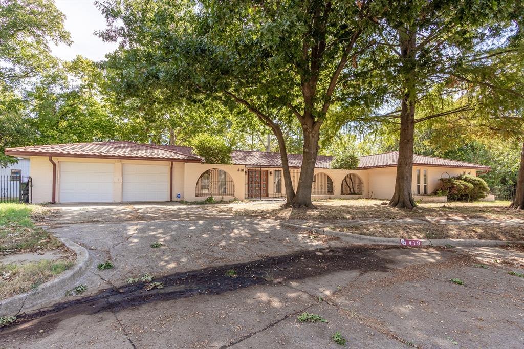 LOCATION, MAJOR UPDATES & SPACE - this one checks the boxes! Tucked away on a quiet cul-de-sac in Norman, this distinctive 4-bedroom, 2.5-bath home offers a convenient location near highly rated elementary school options, approximately 5 minutes from the University of Oklahoma campus, with quick access to I-35 and an easy drive to Will Rogers International Airport and Downtown OKC. Beyond the location, this home stands out for the major systems and improvements already in place, including a Gerard 26-gauge stone-coated Spanish-style metal roof, dual-zone HVAC systems, a whole-home Generac generator, updated plumbing, updated electrical panel, sprinkler system, and an in-ground storm shelter located in the 2-car garage. Inside, the spacious and flexible floor plan offers room to live, work, and entertain. The sunken living room features a cozy fireplace and beautiful hardwood flooring that continues into the dining area, complemented by updated LVP flooring and fresh interior paint throughout much of the home. The kitchen features double ovens, stainless steel appliances, abundant cabinetry, pantry space, and a window overlooking the private courtyard. The oversized primary suite offers multiple closets and a remodeled spa-like bathroom with dual sinks, a jetted tub, and an impressive walk-in shower with body jets, rain showerhead, and handheld sprayer. A dedicated study with built-ins and a separate bonus space provide even more flexibility for a home office, gym, media room, or playroom. Outside, enjoy a fully fenced backyard with lush grass, mature shade trees, refreshed landscaping, a charming courtyard, and two storage buildings. With major improvements already completed, abundant storage, versatile living spaces, and a hard-to-beat Norman location, this home offers a combination that is difficult to find!