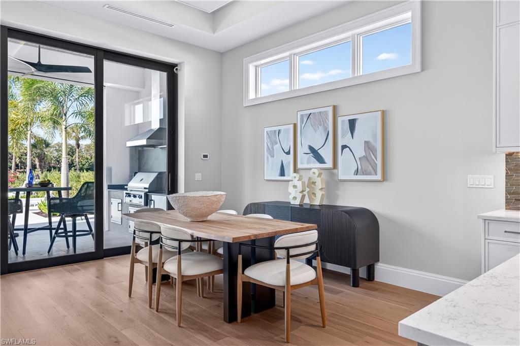 Dining area featuring light wood-style flooring