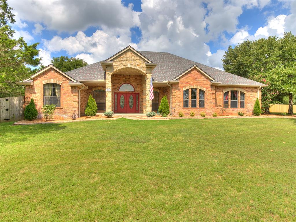 Discover a property that offers far more than an ordinary home. Situated on approximately 2.16 acres just one mile from a Lake Thunderbird boat ramp, this impressive 2,831-square-foot residence combines comfortable living, exceptional entertainment spaces, and amenities rarely found together in one property.Inside, the home features an inviting living area with a fireplace, a formal dining room, and a thoughtfully equipped kitchen with a JennAir cooktop, double ovens, and a new microwave with air-fryer capability. Additional conveniences include a central vacuum system, water softener, and whole-home water filtration system.The luxurious primary suite is a private retreat, complete with its own fireplace, an ensuite laundry room, a Jacuzzi tub, and an impressive walk-in shower with six shower heads.Entertainment is at the heart of this home. Enjoy movies, sporting events, and more in the expansive theater room, featuring a Sony 4K projector, an impressive 135-inch screen, and an immersive 11.2.4 Dolby Atmos surround-sound system. A pool table and a 120-gallon saltwater aquarium add even more character to the home’s interior.The outdoor living space is equally remarkable. A covered, attached pavilion with a fireplace, built-in grill, and hot tub creates an extraordinary setting for year-round relaxation, entertaining, and gatherings while overlooking the peaceful acreage.For vehicles, hobbies, equipment, or business needs, the property includes an attached three-car garage and a fully insulated, drywalled, and heated 1,500-square-foot workshop—an exceptional feature that truly sets this property apart.Recent improvements include a newer roof and updated HVAC systems. An ADT security system with exterior cameras provides additional peace of mind.With acreage, nearby lake access, extensive entertainment amenities, an outstanding workshop, and exceptional indoor and outdoor living spaces, this prime property must be experienced in person.