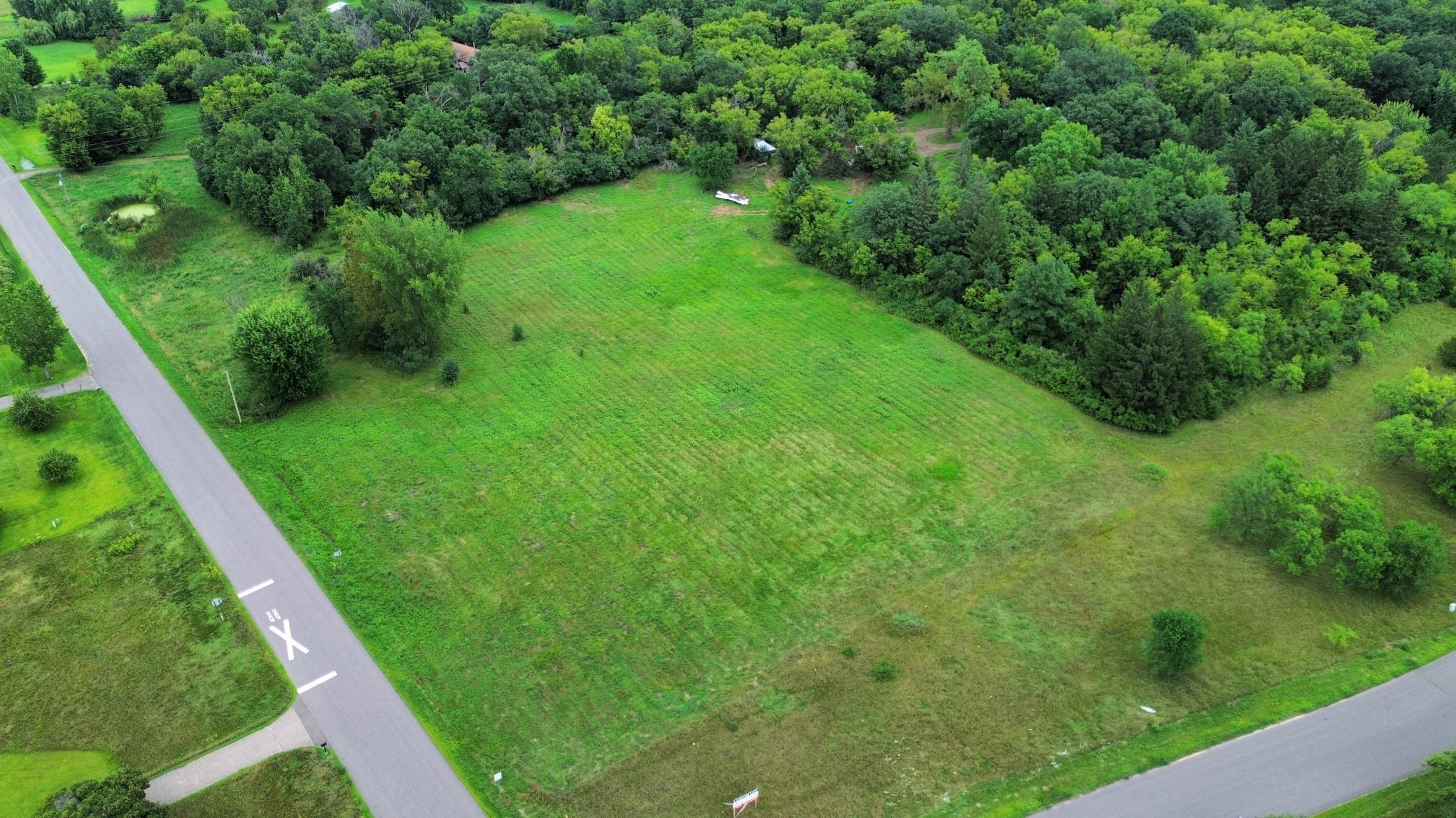 Build your dream home on this large 2.7 acre lot (lot 1) in a desirable Elk River location. Each lot offers a peaceful natural setting with room to spread out while keeping the convenience of town close by.Electrical available at the street.Buyer to install private well and septic.Easy access to Hwy 169, schools, shopping, and restaurants.Plenty of space for your home, garage, and outbuildings.Enjoy the best of both worlds — quiet acreage living with amenities just minutes away.