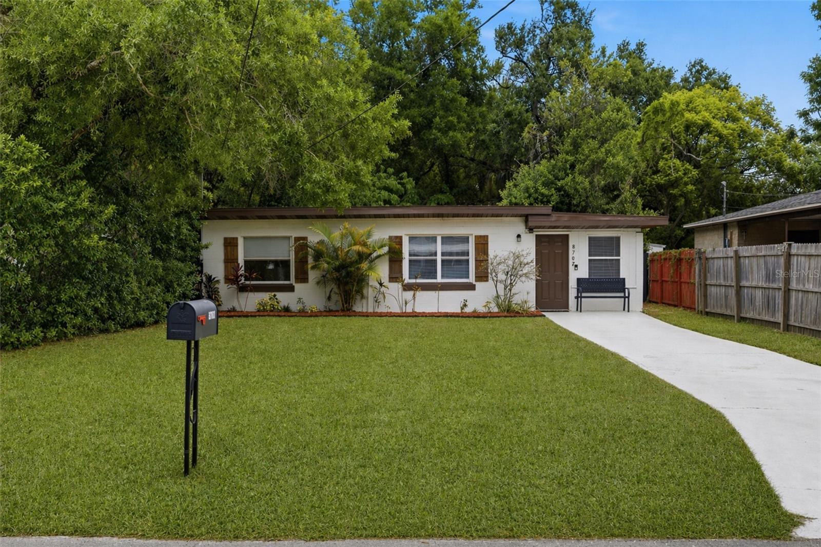 Welcome to this charming, fully furnished, move-in-ready home offering the perfect blend of comfort, flexibility, and proven income potential—an excellent opportunity for both owner-occupants and savvy investors. Currently configured as a 2-bedroom, 1-bath residence with an additional bonus room featuring a closet—easily convertible into a 3rd bedroom—this property provides versatile living options to fit a variety of needs.For those seeking an investment opportunity, the home has operated successfully as a short-term rental for several years, averaging approximately $30,000 in annual gross income, offering immediate cash flow and a consistent rental history. At the same time, its inviting layout and comfortable feel make it equally ideal as a primary residence or second home.The home has been well-maintained and offers peace of mind with key updates, including a brand-new TPO flat roof on the right side of the home, along with durable block construction. Inside, you’ll find walnut wood-tone ceramic tile flooring throughout, a cozy fireplace, and a clean, well-kept interior that’s ready for immediate occupancy or continued rental use.Step outside to an expansive, fully fenced backyard designed for both relaxation and entertainment, featuring a basketball court, putting green, and ample space for gatherings. The oversized lot adds even more flexibility and is located in an area where **ADU development may be permitted—buyer to verify zoning and approvals—**offering potential for future value-add opportunities.Whether you’re looking to enjoy the home as your own, generate income, or hold as a long-term investment, this property truly checks all the boxes. Conveniently located just 3.5 miles from Busch Gardens and under 5 miles to the University of South Florida, with easy access to I-275, this home offers exceptional convenience to local dining, shopping, and major roadways—making it a rare opportunity to enjoy both lifestyle appeal and strong investment performance. Don’t miss your chance—schedule your showing today!