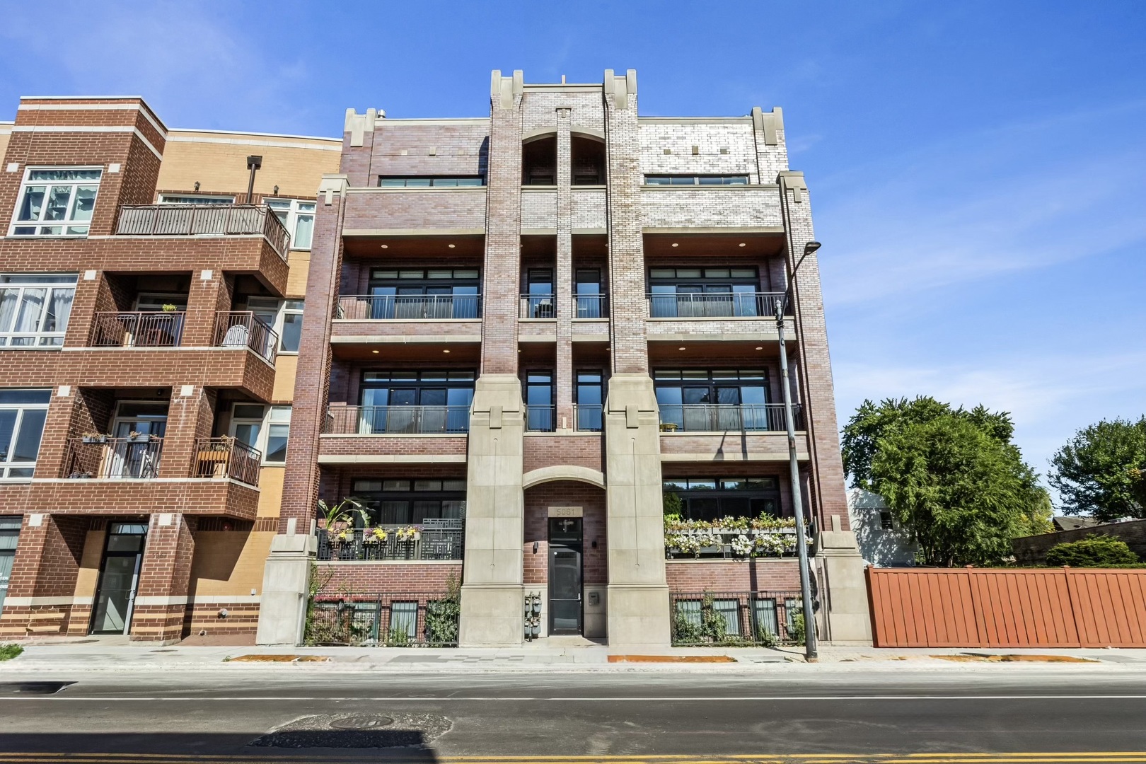 Welcome to this Stunning 1600 SF Corner Unit Condominium in the Heart of Lincoln Square, offering a Rare Blend of Modern Luxury, Thoughtful Design, and Unparalleled Outdoor Space on the One-of-a-Kind Private 960 SF Terrace. Step inside to find Tall Ceilings, Custom-Stained Hardwood Floors, and Ornate Millwork that highlight the Open Floor Plan. The Gourmet Kitchen is a True Showstopper, featuring 42" Cabinets with Under-Mount Lighting, Quartz Countertops, a Large Island with Seating for Four, Custom Backsplash, Thermador Dishwasher and Range with Exterior-Vented Hood, BOSCH French Door Refrigerator with Ice Drawer. The Kitchen flows seamlessly into the Living Room with its Tile Surround Gas Fireplace, Custom Built-ins, and Access to the Private Balcony with Composite Decking. An Entertainer's Dream, the One-of-a-Kind 960 SF Private Terrace complete with Built-in Fireplace, Italian Porcelain Pavers, Direct Gas Line for an Outdoor Kitchen, Water Spigot, Lighting, and Built-in Speakers is perfect for Gatherings, Grilling, or Quiet Evenings under the Stars. The Oversized Primary Suite features a Walk-in Closet with Custom Organizers and a Luxurious EnSuite with a Double Sink Quartz Vanity, Walk-in Steam Shower with Bench, and Linen Closet. Two Additional Bedrooms provide versatility for Guests, Family, or a Home Office. Additional highlights include: Built-in Speakers in Living Room, Primary Bedroom, and Terrace, 8' Solid-Core Doors, Custom Window Treatments, Convenient Mudroom Area with Seating, Hooks and Cabinetry, Smart Thermostat, LED Recessed Lighting, In-Unit Front-Loading Washer and Dryer, Gas Line on Front Porch, On-site Storage, Bike Storage, Central Heat and Air, Heated Garage Parking (Space #5) included. This Sought-after Budlong Elementary and Amundsen High School District Location is Moments to: Rockwell & Western Brown Line Stations, Ravenswood Metra, minutes to Winnemac and River Park, steps from Shopping and Dining, and you'll love the Annual Street Festivals.