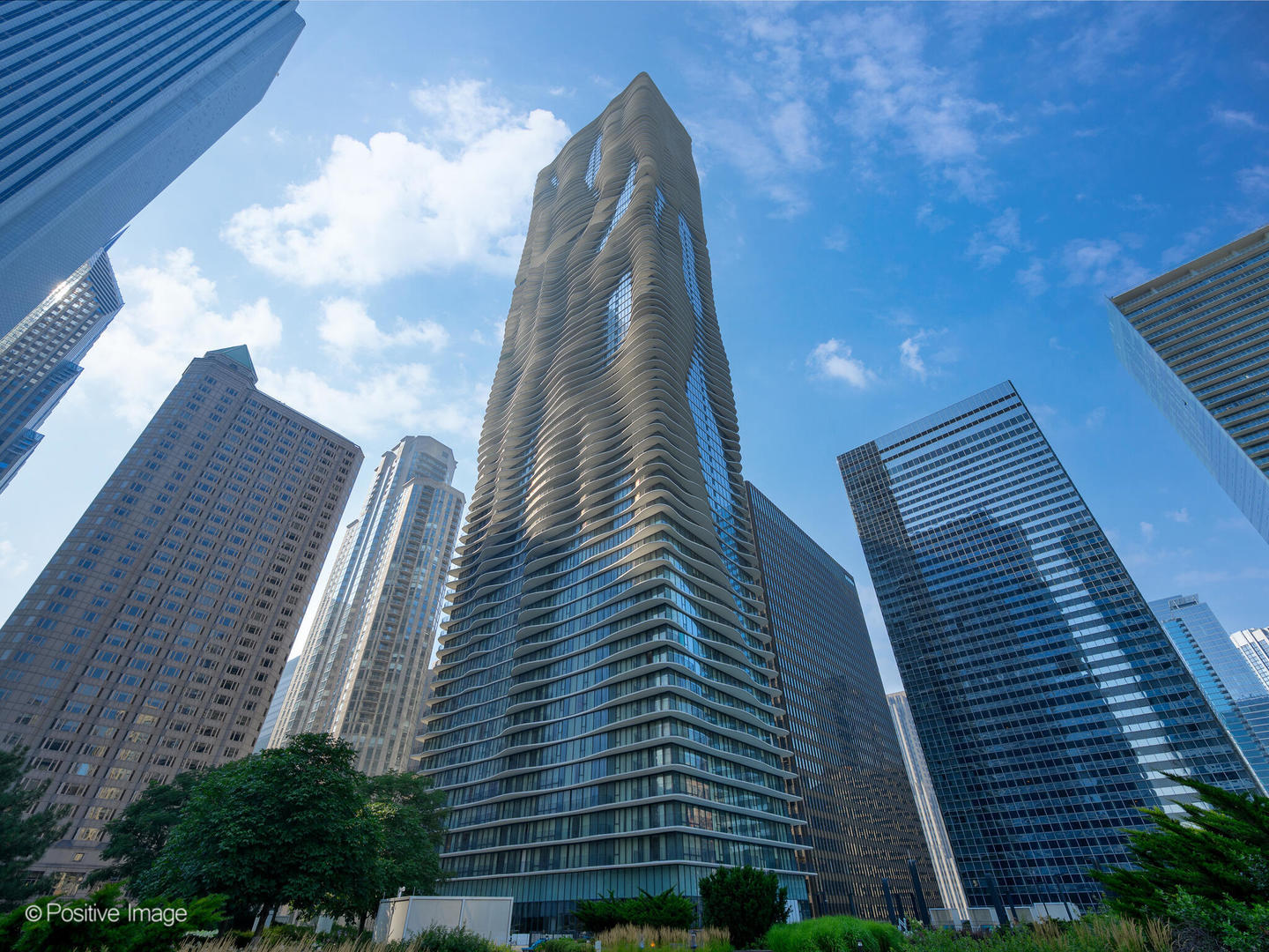 Live above it all at Aqua in Lakeshore East! This renovated 3 bed, 2.1 bath home offers iconic southwest views from a full wraparound balcony. Features include new engineered hardwood floors, Sonos surround sound, Lutron blinds, heated primary bath floors and fresh finishes throughout. Aqua is a resort-style building designed by STARchitect Jeanne Gang, with pools, fitness center, spa, sun deck & more. Live blocks from the lakefront, Millennium Park, Michigan Avenue and the city's best dining and culture., 30% rental cap is currently met: no rentals. Gated, heated garage parking available for $55,000 and multiple parking spots available for rent via Metropolis parking.