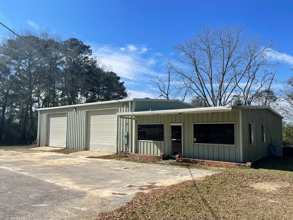 Great Investment property or run your business out of the commercial building.   200 Dillon Rd.-  2800 sf Shop/Office (1973) on one acre zoned CL and AG. The building has spray foam insulation in the shop ceiling and has two roll up  bay doors. Central Heat and Air.  Office/Garage Served by Septic Tank   Property is adjacent to  AG and R-3, Zoned property. property. -   City Water is already at the property.  Minutes to Downtown. Youtube Video available and Land ID Link available.