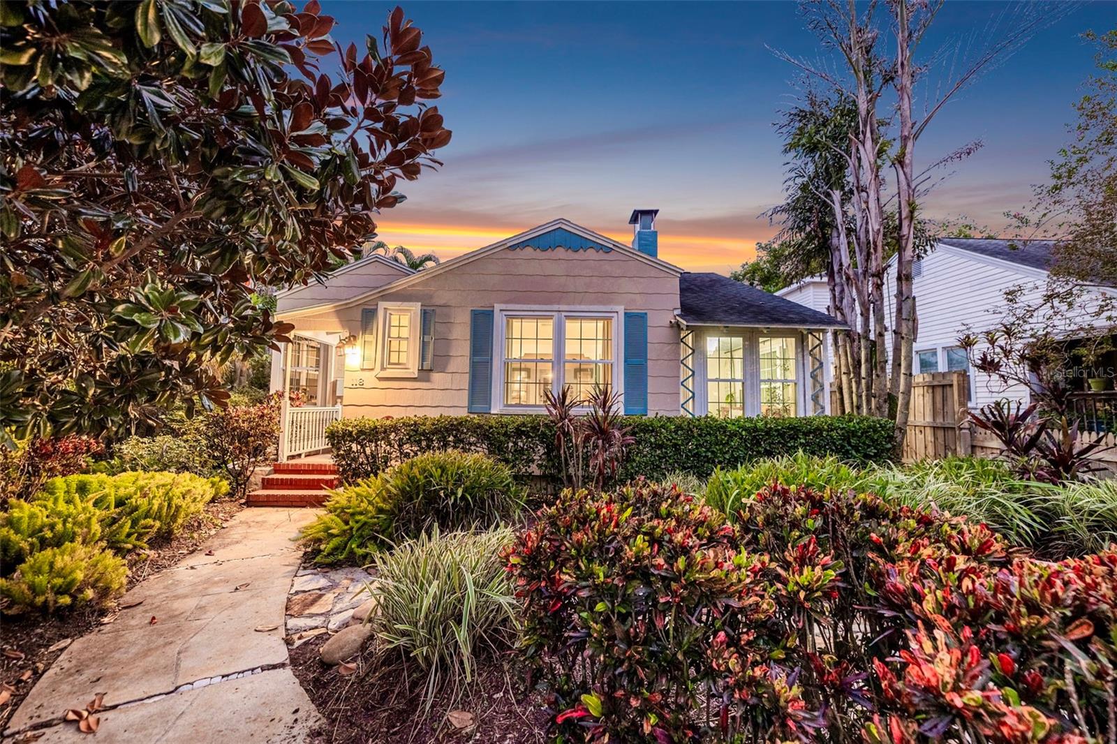LIVE THE OLD NORTHEAST LIFESTYLE! Beautifully renovated and ideally situated in one of St. Petersburg’s most beloved neighborhoods, this charming 2-bedroom, 2-bath pool home offers the perfect combination of historic character, modern updates and an exceptional setting—all while being located in a non-flood zone.One of the best parts of living here is what’s just outside your front door. Take a short stroll to the scenic waterfront sidewalk along North Shore, where you can walk, run or bike for miles beside Tampa Bay and through some of St. Petersburg’s most beautiful waterfront parks. From morning walks along the water to evenings downtown, this location makes it easy to enjoy the lifestyle that makes Old Northeast so special. Restaurants, cafés, museums, shopping, Beach Drive and the vibrant downtown waterfront are all just minutes away.Step inside and one of the first things you'll notice is the phenomenal natural light. An abundance of windows fills the home with sunshine and creates a bright, airy atmosphere throughout. The inviting living room makes an immediate impression with its dramatic vaulted, beamed ceiling, beautiful hardwood floors, fireplace and custom built-ins, bringing together the warmth and architectural character of the home.The completely renovated kitchen features crisp white cabinetry, quartz countertops, a stylish tile backsplash, stainless steel appliances and generous workspace for both everyday living and entertaining. The open, light-filled interiors create an easy flow and a wonderful connection to the outdoor living spaces.The spacious primary bedroom features hardwood flooring, beautiful natural light and charming architectural details, while French doors further enhance the home's indoor-outdoor feel.Step outside to your own private backyard retreat, where a sparkling pool and generous patio create the perfect setting for entertaining or simply enjoying the Florida lifestyle. The covered patio is made even more enjoyable with motorized screens, allowing you to open the space to the pool and backyard or create a comfortable screened outdoor living area at the touch of a button.Adding even more versatility is the detached one-car garage with convenient alley access and a full bathroom—a unique and valuable feature offering additional possibilities beyond simply parking and storage.Beautifully updated while retaining the character that makes Old Northeast homes so desirable, this property offers an increasingly hard-to-find combination: a renovated pool home in a non-flood zone with phenomenal natural light, flexible bonus space and the waterfront, parks and downtown St. Petersburg lifestyle right outside your door.