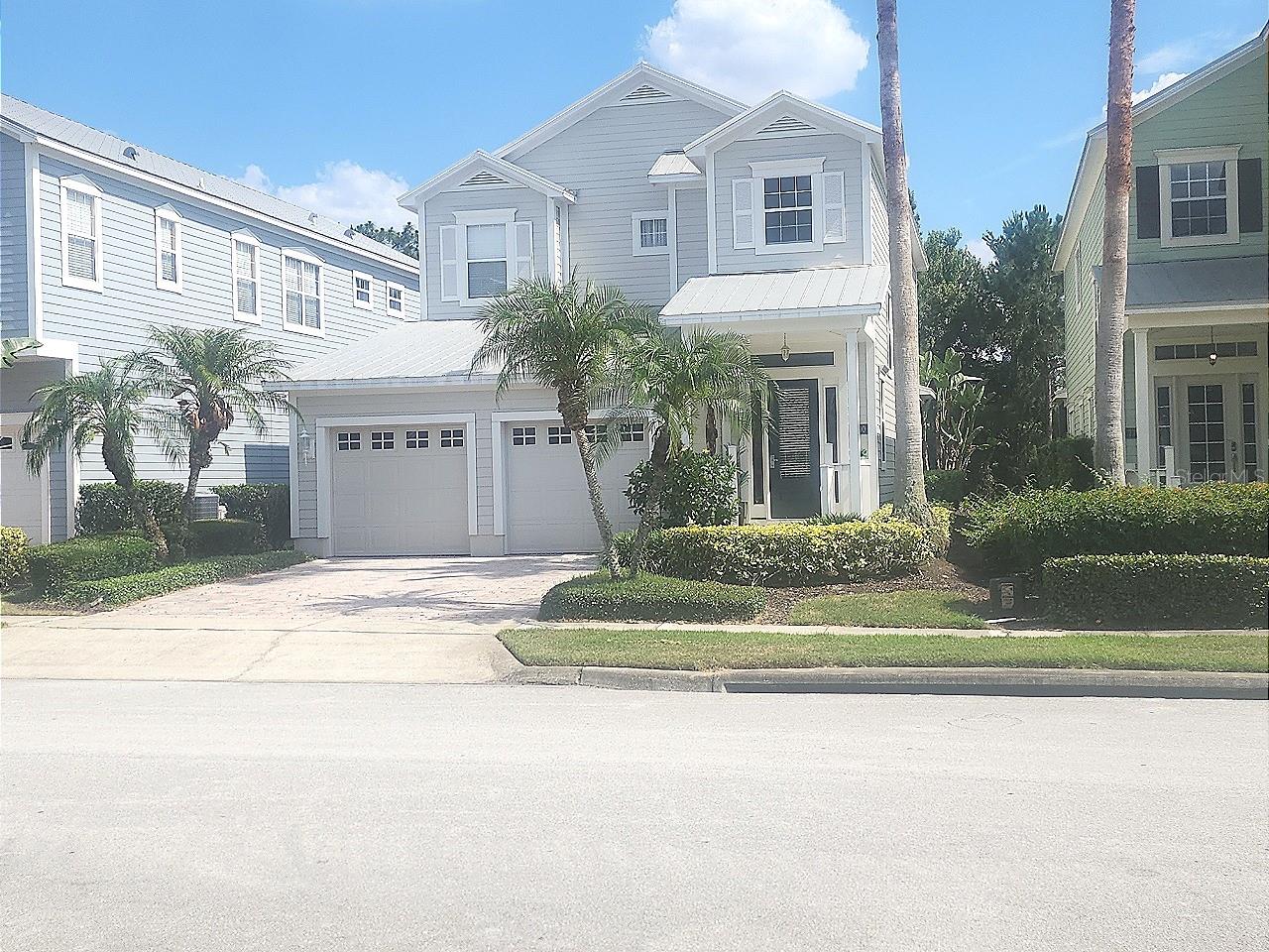 Price reduced for this beautiful 4/4 in Patriots Landing with no rear neighbors.  This home has a full length screened in covered patio that can be accessed by the beautiful French doors across the back wall, making this home feel it is one with nature.  Downstairs features a large dining area fit to entertain, with a large open family room and dining.  You have a view all the way from the kitchen.  The downstairs bedroom has a separate full bathroom while upstairs you have  3 additional bedrooms each with their own bathroom.  The master bedroom is a luxurious suite with a splendid bathroom with a garden tub and separate shower.  The outside of the house was painted in August 2022, the owner also had the metal roof recertified around that time for insurance purposes.  The home boast 2 newer AC's and a new hot water heater too.  Inside has a fresh coat of paint done last year. Reunion is full of amenities.  There are several pools available, restaurants, playground, walking paths and fitness center. 
This is a great neighborhood to have your primary home or use it as short term rental investment property.