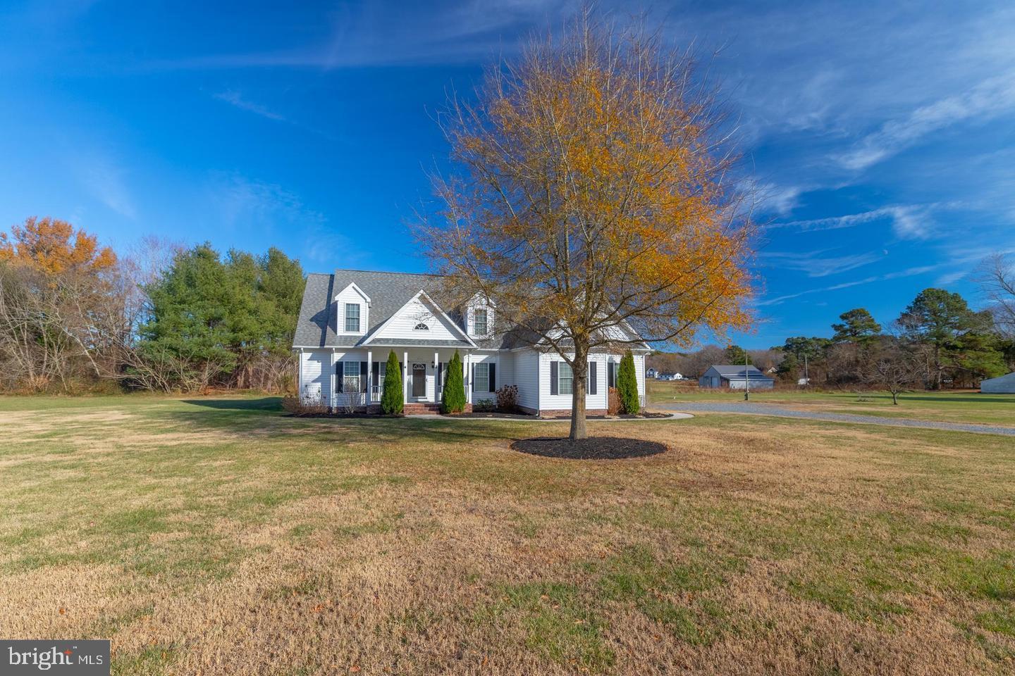 LOCATION, LOCATION, LOCATION! This beautiful home is ideally situated between Berlin and Ocean City on 2.5 acres of cleared land, offering endless possibilities—add an inground pool, pole barn, or create the perfect setup for a home-based business. No city taxes and NO HOA fees.Built by Beracah Homes, this property features an excellent floor plan and has undergone extensive updates in 2025–2026. The fully renovated kitchen showcases new cabinetry and hardware, granite countertops, tile backsplash, and energy-efficient stainless steel appliances. Bathrooms have been updated with new vanities, faucets, mirrors, and light fixtures. The first floor boasts all new lighting and brand-new LVP flooring throughout.The main level includes a primary suite with private en-suite bath, a second bedroom and full bath, a separate dining room, a spacious living room with a wood-burning fireplace, a half bath, and a rear screened-in porch under roof—perfect for relaxing year-round.Upstairs you’ll find a loft/landing area ideal for a workspace, two oversized bedrooms, an office, and another full bath featuring a new double vanity, mirrors, and fixtures.Recent improvements also include the septic system just pumped, drain field rooted, and a new distribution box installed.  Geo thermal heating on the first floor with new heat pump servicing the second level. There are no other properties currently available offering this amount of land this close to everything, making this a rare opportunity.Located just one mile from Stephen Decatur schools and minutes from Ocean Pines, Ocean City, Assateague Island, and Historic Berlin, with Salisbury Airport only 20 minutes away. If you’re seeking space, convenience, and freedom from fees and city taxes—this is the one.