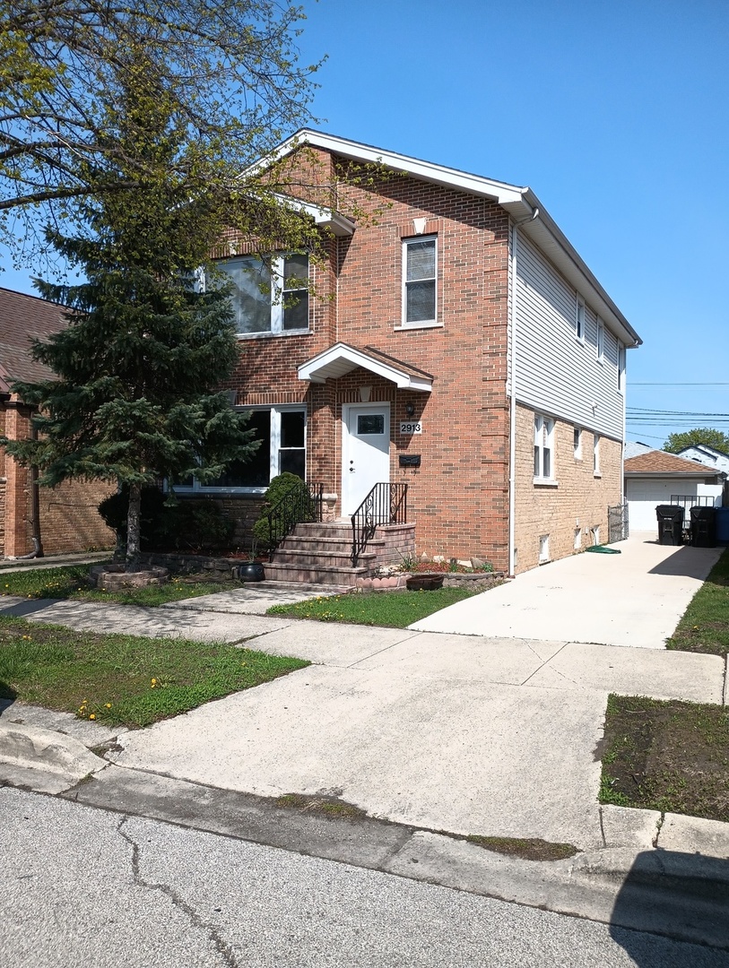 Big price drop Very motivated seller House is perfect for big family or in laws arrangements 3 floors with separate entrances Kitchen and full bathroom on each floor Hardwood floors 2 car garage independent heating and air condition on second floor Tons of storage space Agent related to the seller