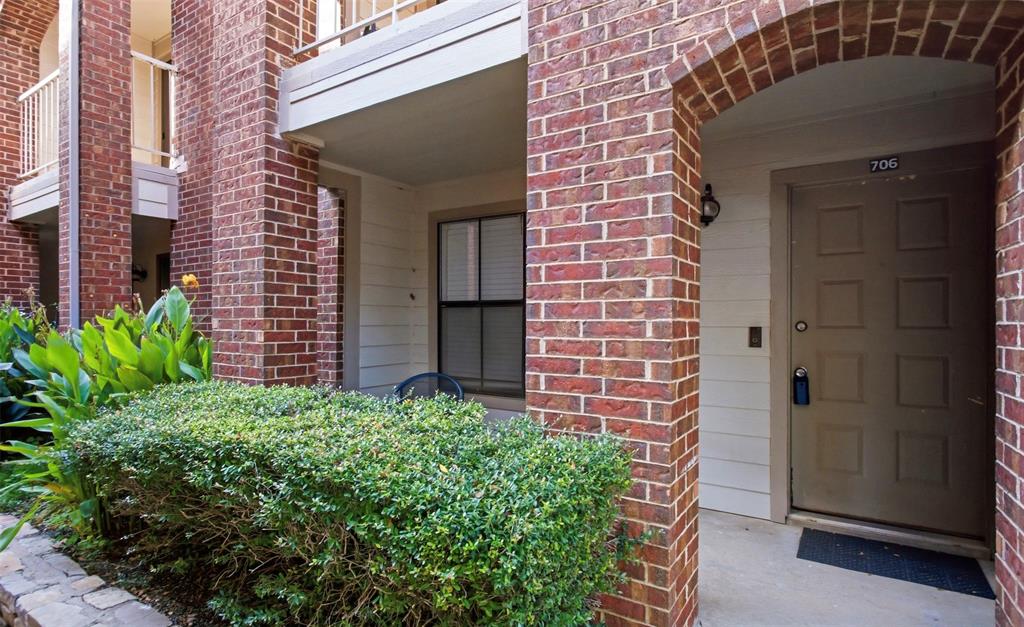 Welcome to this beautifully updated 2-bedroom, 2.5-bathroom unit in a great location! The updated kitchen features quartz countertops and a large kitchen sink, while the updated primary bathroom adds a fresh, modern touch. Additional features include separate AC units for the upstairs and downstairs and a security system.The inviting living area features a wood-burning fireplace and hardwood floors throughout the primary-level living spaces, with comfortable carpeting in the bedrooms. The spacious primary bedroom also offers a charming reading nook-perfect for relaxing with a good book or creating a cozy personal retreat.Enjoy the convenience of a dedicated covered parking space. With its desirable location and thoughtful updates, this home is a wonderful blank canvas for the new owner to add their personal style and make it their own.
