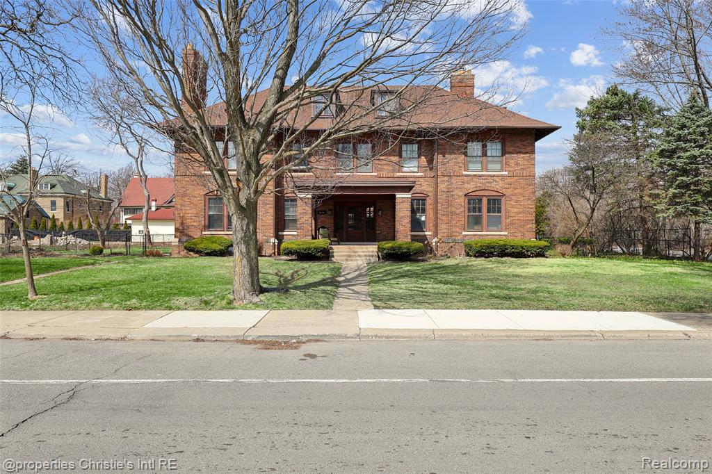 Timeless Grandeur Meets Modern Peace of Mind-A Boston-Edison Masterpiece on a Rare Double Lot--Experience the perfect harmony of historic preservation and rigorous modern updating in this stately residence. Situated on a coveted double lot within Detroit’s premier historic district, this home offers a level of scale and structural integrity that is truly rare. From the expansive manicured grounds to the three-car garage, every inch of this property has been curated for a lifestyle of elegance and ease. While the historic charm is evident, the true value lies in the extensive, high-level infrastructure updates completed to ensure another century of service: Updated electrical and plumbing systems. A comprehensive water remediation system has been installed around the perimeter, complemented by a professionally cleaned and cleared basement. Asbestos has been professionally encapsulated, and a state-of-the-art alarm and security system has been integrated. The interior retains its original soul, now enhanced by thoughtful modern comforts. The grand fireplaces have been professionally cleaned and serviced, ready to serve as the heart of the home once again. The kitchen and utility areas feature brand-new premium appliances, including two innovative all-in-one washer/dryer units for ultimate convenience. Whether you are hosting in the formal living rooms or enjoying the sun-drenched views of the yard, the flow of this home is effortless. The rare double lot offers a private sanctuary in the heart of the city. Outdoor upgrades include: New Aggregate Patio: A stunning space for al fresco dining and entertaining. A freshly repaired front sidewalk and meticulous landscaping frame the home’s commanding presence. The rare three-car garage provides plenty of space for vehicles and hobbies alike. This is more than a home; it is a meticulously maintained piece of Detroit history, ready for its next chapter.