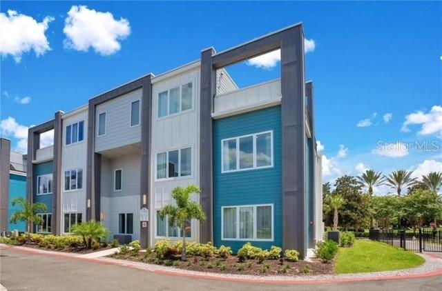 BEAUTIFUL 5 BEDROOMS 4 BATHROOMS CONDOMINIUM CORNER UNIT RIGHT CROSS FROM THE PRIVATE WATER PARK FEATURE BEAUTIFULL  OUTDOOR TERRACE . AT THE ENTRANCE OF THE BUILDING, YOUR TAKE THE STAIRS THAT LEAD YOU TO THE MAIN FRONT DOOR, THIS GORGEOUS  2700 SQFT TWO STORY CONDOMINIUM WITH 24 FOOT CEILING LARGE WINDOWS WITH NATURAL LIGHTS, FEATURE 24X24 PORCELAIN FLOORING WITH QUARTZ COUNTER TOP A WATERFALL ISLAND, SAMSUNG STAINLESS STEEL APPLIANCES AND SIDE BY SIDE REFRIGERATOR NOT TO MENTION WATERFALL LARGE ISLAND KITCHEN WITH MODERN AND CONTEMPORARLY STYLE CABINETS. THIS BEAUTIFUL 5 BEDROOMS CONDOMINIUM HAS 4 BEDROOMS ON THE MAIN FLOOR THEN 5TH ADDITIONAL BEDROOM ON THE TOP FLOOR WITH LOFT AND GAME AREA SOLD FULLY FURNISHED . THIS ONE OF A KIND CONDOMINIUM WILL BE GREAT USE AS PRIMARY RESIDENCE OR SECOND HOME BEAUTIFULLY DECORATED OUTDOOR ROOFTOP WITH WITH BUILTIN LIGHTS ,PICTURE PERFECT TO UNWIND AND ENJOY THE LIFE. THIS GORGEOUS 5 BEDROOMS IS LOCATED INSIDE RENION RESORT WITH PRIVATE THREE PGA GOLF COURSES: JACK NICKLAUS, TOM WATSON AND ARNOLD PLAMER IN ADDITION TO THIS MEMBERSHIP, YOU HAVE ACCESS TO PRIVATE WATER PARK WITH LAZYRIVER TO COOLOFF AFTER LONG DAY AT THE PARK OR SIMPLY GRAB QUICK BITES AT RESTAURANT LOCATED ON THE ROOFTOP AT ELEVEN FLOOR OVERLOOKING EPCOT CENTER WHERE YOU CAN SEE BEAUTIFUL LUMINOUS FIREWORKS.IF YOU ARE FEELING MORE FORMAL OR ON BUSINESS TRIP YOU CAN HEAD TO THE FINE DINING THE CHOP STEAKHOUSE RESTAURANT AT THE GRAND HOTEL OR SIMPLY MEET FRIENDS TO ENJOY CASUAL COCKTAIL AT SUSHI BAR. IN ADDITION TO THE WATER PARK, REUNION HAS 14 SWIMMING POOLS THROUGHOUT THE RESORT, MINIATURE GOLF COURSE, GOLF CARTS STATION, TENNIS COURSE, LEADBETTER GOLFZON,STARBUCKS, SHOPS AND OF COURSE THE TRADITION CLUBHOUSE OVERLOOKING AT THE 18TH FAIRWAY TO ENJOY SUNDAY BRUNCH WITH MILLION DOLLAR VIEW. THIS ONE OF KIND CONDOMINIUM COMES WITH TRANSFERABLE ACTIVE MEMBERSHIP SO YOU CAN ACCESS ALL THOSE AMENITIES AND HAS IS ALL!!!