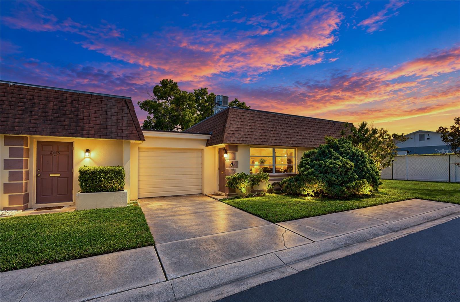 Welcome to easy living in Vendome Village, a thriving 55+ community in the heart of Pinellas Park! This 2-bedroom, 2-bath end-unit condo offers 1,109 square feet of single-story living, with a spacious open layout, a primary suite with en-suite bath and walk-in closet, and an attached one-car garage with laundry. It's perfect for snowbirds, for buyers ready to downsize, or for anyone who wants the comfort and privacy of a real home. The all-inclusive monthly fee covers the community pool, cable and internet, water, sewer, trash and exterior maintenance, and taxes stay low in this land lease community. Enjoy the heated pool, clubhouse, shuffleboard and horseshoes, and plug right into a welcoming community of active neighbors with a full calendar of activities. The location is ideal: minutes to medical facilities including the VA, plus shopping, dining, Sawgrass Lake Park and the Pinellas Trail, with easy access to US-19, downtown St. Pete and the Gulf beaches. Schedule your showing today!