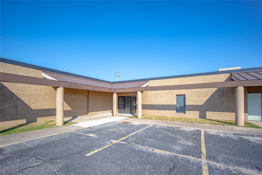FOR LEASE ONLY! Unit 119 at 2278 Industrial Blvd is a 2,325 SF office/flex suite available for lease within a multi-tenant business park on Industrial Blvd in Norman. The suite combines a finished office buildout with an attached workspace and a garage bay, giving a tenant office and shop space under one roof. The front of the suite includes three private offices and a bathroom, finished with carpet and a drop ceiling. The rear includes a workspace and garage bay with an overhead door and its own electrical panel. Power is 3-phase. Property is zoned I-2. The layout suits a tenant needing office space paired with attached shop, storage, or light work area. $12.00/SF/Yr + NNN.