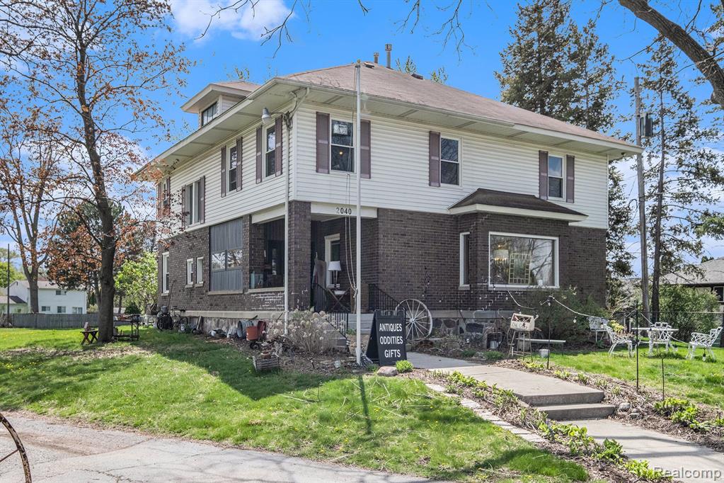 Rare opportunity to convert a spacious 4-bedroom, 1.5-bath property back to residential use in a prime location just off Saginaw Road on Maple. Currently fully leased as office/retail space, this former home offers 3,214 square feet of versatile space and could be restored to a beautiful residence with a variance. The main level features a living room with fireplace, formal dining room, family room, guest bath, and a large kitchen—ideal for everyday living and entertaining. Upstairs you'll find four bedrooms, a full bath, and a charming sitting room that could serve as a fifth bedroom or private office. The generous lot includes 36 parking spaces, offering room for future outdoor living, guest parking, or hobby space. A truly unique opportunity to create a custom home in a high-visibility, high-convenience location. Seller is open to Land Contract/Seller Financing.