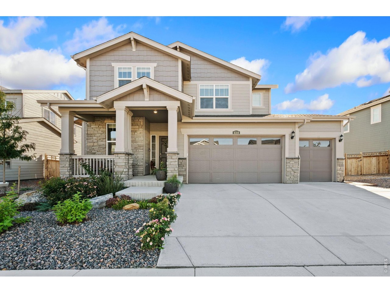 Why settle for builder-basic when you can have nearly new construction with the designer upgrades and landscaping already done? Welcome to 4314 Amanda Dr in Johnstown's Ledge Rock community! Built in 2024, this beautifully enhanced home offers 4 bedrooms, 3 bathrooms, 2,391 square feet, and an oversized 3-car garage, with thoughtful improvements that set it apart from the competition. Step inside and feel the difference! Fresh Sherwin Williams "Duration" wall and trim paint, custom light fixtures throughout, and new luxury vinyl plank flooring on the staircase, upper hallway, and main-level study create a polished, cohesive look. Natural light pours into the living spaces, while the open floor plan offers an inviting atmosphere for gathering and entertaining. The spacious kitchen features a brand-new range with double ovens, and the dedicated study provides valuable flexibility. Upstairs, all 4 bedrooms are conveniently located on the same level, including the spacious primary suite, which has gorgeous hard surface flooring. Outside is where this home really separates itself from new construction! Intricate front landscaping creates beautiful curb appeal, while the fully fenced backyard has been thoughtfully designed for gardening, lounging, playtime, and entertaining. No starting from scratch with bare dirt or waiting for landscaping to mature! There are producing peach, cherry, plum, and apple trees, already in place along with Aspen, weeping larch, and rising sun redbud trees. The location is another standout! Enjoy quick access to I-25 and Highway 60, making travel throughout Northern Colorado a breeze. Nearby Ledge Rock Center provides shopping and dining, while downtown Johnstown, Lake Park, and Johnstown Reservoir offer additional recreation and local charm. Nearly new, beautifully upgraded, and full of natural light and personality! Come experience the difference at 4314 Amanda Dr!