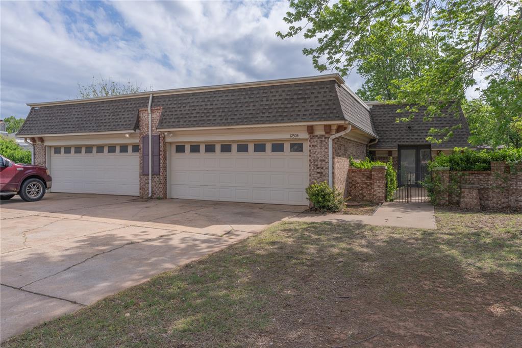 This incredible investment opportunity in The Greens offers a spacious and well-maintained duplex perfectly positioned for a savvy investor or a homeowner looking to house-hack in a premier North Oklahoma City location. Each expansive unit features 3 bedrooms, 2 bathrooms, a private two-car garage, and its own fenced backyard, providing the feel of a single-family home. The interiors are highlighted by inviting living areas anchored by a cozy corner fireplace flanked by custom built-in shelving, adding both character and functionality. With unit 12304 completely move-in ready and unit 12308 currently generating income through August 2026, this property provides immediate stability and long-term potential in a high-demand area known for its proximity to golf courses, shopping, and easy highway access.