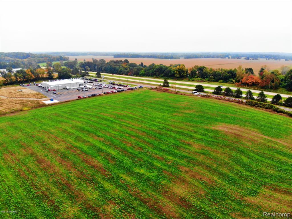 INVESTORS! This parcel is located along I-94 at exit #124 on the Northeast corner. This intersection provides high visibility from I-94 and M-99 offering commercial development potential. The property currently is being leased by a local farmer for row crops. Seller is offering land contract terms as well as built-to-suit. Set up an appointment today to capitalize on this investment opportunity! Land contract terms are negotiable. Seller is related to agent. Buyer to verify all information.