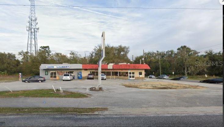 Seller is looking to combine this parcel with another parcel which is right behind this property. 
Laundromat is currently leased to long term tenant. 

Seller is willing to share plans for a new strip center that was to be build next to this one. Survey is also available.

Note: buyers I emphasize the importance of conducting thorough due diligence to ensure that the property meets your expectations and requirements.
