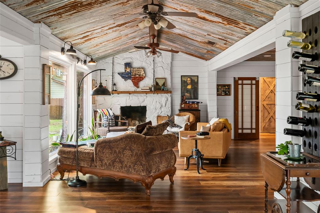 RARE. INTENTIONAL. VERSATILE. Positioned just moments from Eagle Mountain Lake, this property spans .59 ± acres & unfolds as a property where the story lives in the details, a reflection of thoughtful design, purpose & long term vision across three distinct structures. The main residence anchors the property with 3 beds, 2.5 baths & a flexible study or potential 4th bed, where interiors feel collected & design driven, layered with texture & curated materials that create depth. Reclaimed sheet metal ceilings introduce contrast, while the renovated kitchen serves as the focal point with an oversized island, custom cabinetry & a layout designed for both everyday living & entertaining. Natural light moves throughout the home, highlighting updated flooring, refined finishes & a warm, cohesive palette. Beyond the main residence, 2 cottages with a private entrance extend the opportunity, including a 560 sqft cottage with a true 2 bed, 1 bath layout & a 360 sqft cottage offering a 1 bed, 1 bath configuration, both currently operating as short term rentals with established income potential. The layout supports multigenerational living, a primary residence with supplemental income or a fully investment driven approach, while extensive improvements including roof, plumbing, electrical, windows, HVAC & a full septic system servicing all 3 structures provide confidence. Let your dreams run wild with how this property can be used, whether a boutique short term rental concept, live work setup, private retreat or even an intimate wedding venue or small scale event space with the right vision & approvals, offering a framework that adapts to how you want to live, host or invest. Located minutes from Lakeview Marina, The Resort Golf Club & approximately 30 minutes from the Ft Worth Stockyards & downtown Ft Worth. *Inquire how this property could provide up to $250,907 in potential tax benefits.*