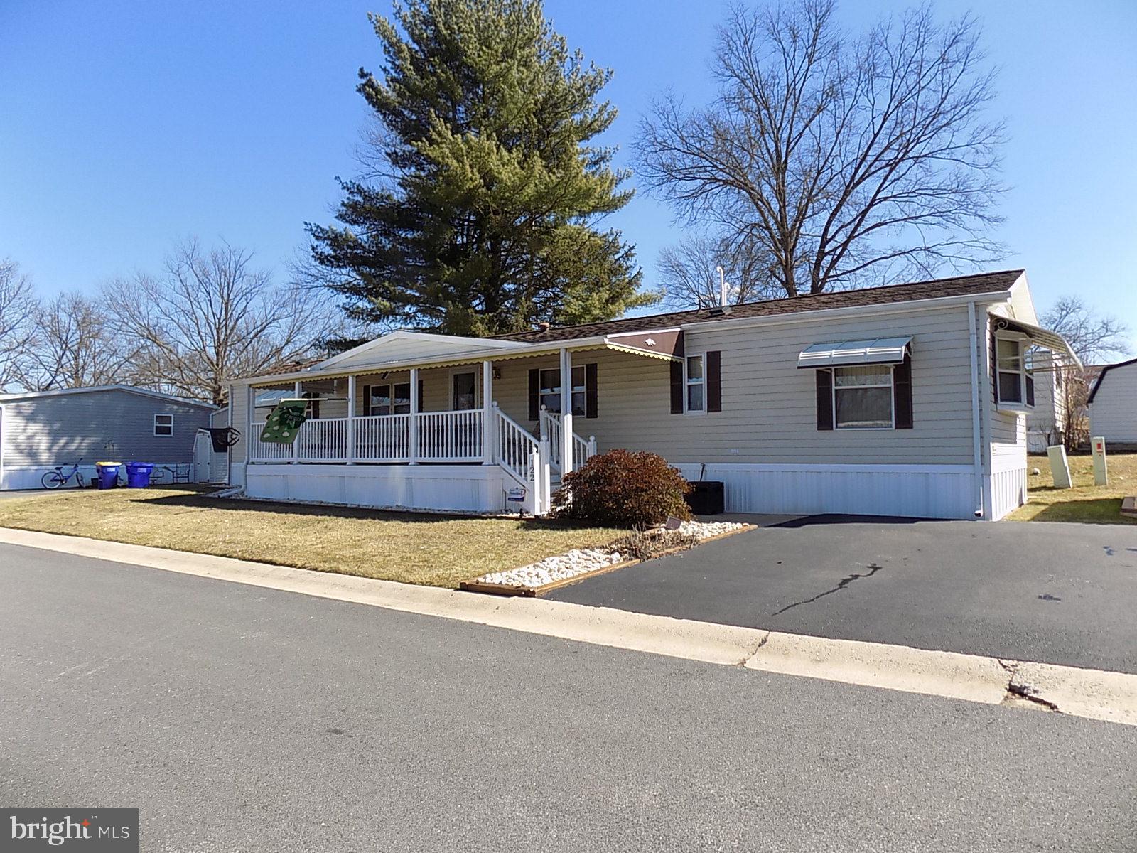Charming One-Owner Home in Desirable Thunderbird Mobile Home ParkWelcome to this well-maintained, one-owner single-wide mobile home, conveniently close to shopping, parks, and everyday amenities. This home was purchased new in 1989 and offers a thoughtful and comfortable floor plan featuring bedrooms and full bathrooms at each end of the home, providing privacy for residents and guests alike. The living room and kitchen are centrally located, creating a natural gathering space and easy flow throughout the home. The property includes all newer appliances, making it move-in ready for its next owner. Enjoy relaxing on the beautiful front porch, complete with awnings for shade and furniture included. Peaceful community setting in a sought-after park location. This charming home offers comfort, convenience, and a welcoming community atmosphere — a wonderful opportunity to enjoy affordable living in a great location.