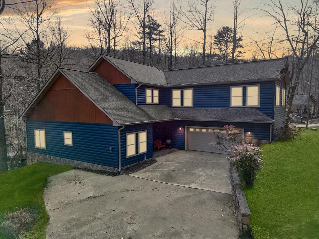 Spacious and well designed home offering 4 bedrooms plus a dedicated office space, currently being used as a gym. Primary suite and laundry conveniently located on the main level. This home features 2 full bathrooms and a half bath, along with brand new appliances in the kitchen. Enjoy indoor-outdoor living on the screened-in porch complete with a Hot Springs salt water hot tub, perfect for relaxing year-round, while taking in the peaceful setting with a creek bordering the lot. Additional upgrades include a new house water filtration system and leaf gutter guards for low-maintenance living. Upstairs, an expansive loft provides flexible space for an additional living room, playroom, or media area. The home also offers ample of storage space, fiber-optic internet, and a fantastic location close to everything you need.