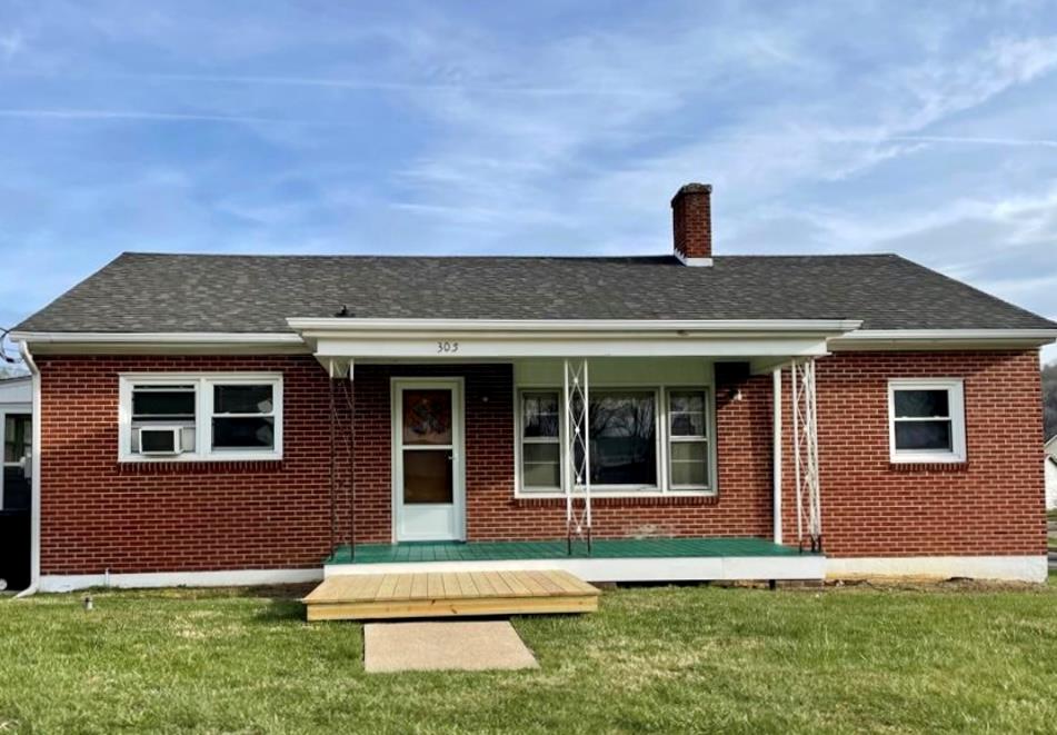 Take a look at this charming single level brick ranch home, located in-town on a quiet dead-end street. The property consists of 4 level to near level lots, creating a very large .46 acre open back yard, a rarity in Fries! Access to the New River Trail is a five minute or less walk away. Bright new kitchen and new paint throughout! There are original hardwood floors throughout the home, including in the kitchen under the new LVP. The huge full sized basement has both interior and outside entryways and is perfect for storing bikes, kayaks, etc., and could possibly be finished off for additional living space. Most plumbing has been replaced, and the electrical service has been upgraded to 200 amp with new meter and panel boxes. Enjoy the quiet of Fries while still being only a 15 minute drive from Galax. Perfect primary home, vacation home, or AirBnB. Owner/agent.