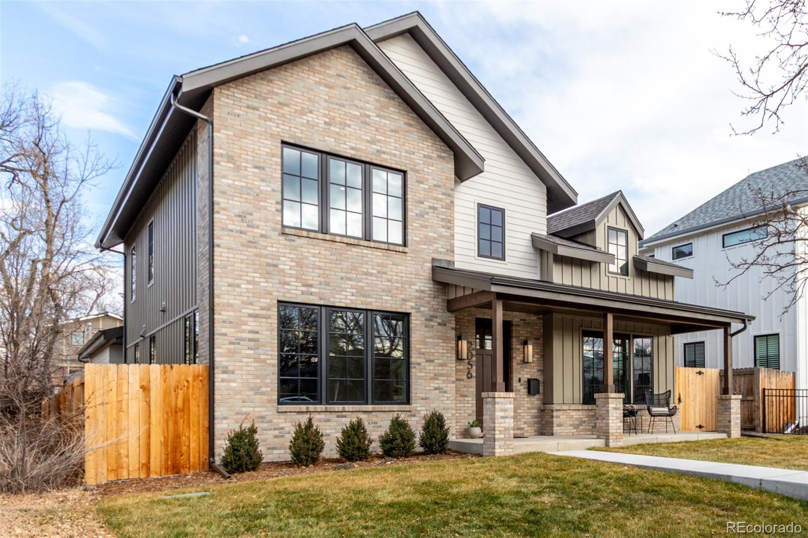 Welcome to an unparalleled luxury custom home in the heart of Platt Park, where sophistication meets comfort on a grand scale. This exquisite property, set on a rare double lot, offers an expansive living experience with no expense spared on the finest finishes and details. Step inside to discover a world of elegance where large windows flood the space with natural light, highlighting the exquisite craftsmanship and attention to detail. The home boasts solid white oak floors throughout, adding warmth and timeless beauty to every room. The gourmet kitchen is a chef's dream, featuring top-of-the-line appliances, custom cabinetry, and a spacious island with stunning Calacatta marble. The open-concept living and dining areas flow seamlessly, offering a perfect setting for intimate gatherings and grand celebrations. Accordion doors and windows open to create a harmonious indoor-outdoor living experience, perfect for enjoying the beautiful surroundings and entertaining guests. The office is a sophisticated space, featuring Taj Mahal natural stone, providing an inspiring environment for work or study. Retreat to the luxurious master suite, a sanctuary of relaxation with a spa-like bath and a large custom walk-in closet. The fully finished basement provides additional living space, ideal for a home theater, gym, or guest suite. An attached two-car garage offers convenience and security. Outside, the meticulously landscaped grounds provide a private paradise. This home is not just a residence; it's a lifestyle, offering the ultimate in luxury living in one of Platt Park's most coveted locations. Just blocks away from world-class dining, shopping, and entertainment, this property offers the perfect blend of tranquility and urban convenience. Experience the epitome of elegance and comfort in this extraordinary home, where every detail has been thoughtfully curated to offer an exceptional living experience.