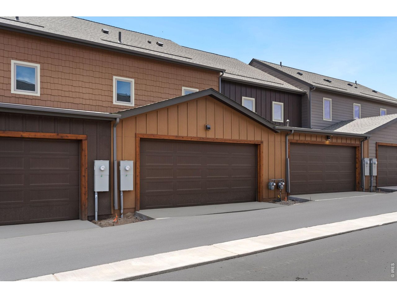 Experience low maintenance, mountain living at its finest in this stunning 3- bedroom, 3-bathroom townhome at 1705 Continental Peaks Circle, Estes Park, CO. Your luxurious mountain retreat as a second home or full time residence awaits! Enjoy the convenience of main floor living, enhanced by air conditioning, a gas fireplace, and 2 car, finished and heated attached garage. Bathed in natural light through cathedral vaulted ceilings and ample windows, this functional floor plan has the primary suite on the main floor for easy living, with the additional two bedrooms upstairs. From the quartz countertops throughout, to the soft close cabinetry and solid core doors and trim, the top-tier construction and finishes throughout showcase uncompromising quality. Enjoy mountain views and miles of trails that take you to town or around Lake Estes. Discover a myriad of outdoor activities, from hiking in Rocky Mountain National Park to exploring charming downtown Estes Park. The HOA maintains the landscaping and exterior maintenance and exterior insurance for peace of mind and convenience. Amazing loan incentives available from the builder and Bank of Estes Park covering origination fees, administration fee, document prep fee, and appraisal fee saving the buyer thousands on closing costs. Let's make your mountain living dream a reality and take advantage of these amazing savings!