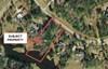 Great waterfront lot in a great residential neighborhood.  A Place In The Woods  subdivision, located on southside of Thomasville.  City water, 2400 square foot minimum.