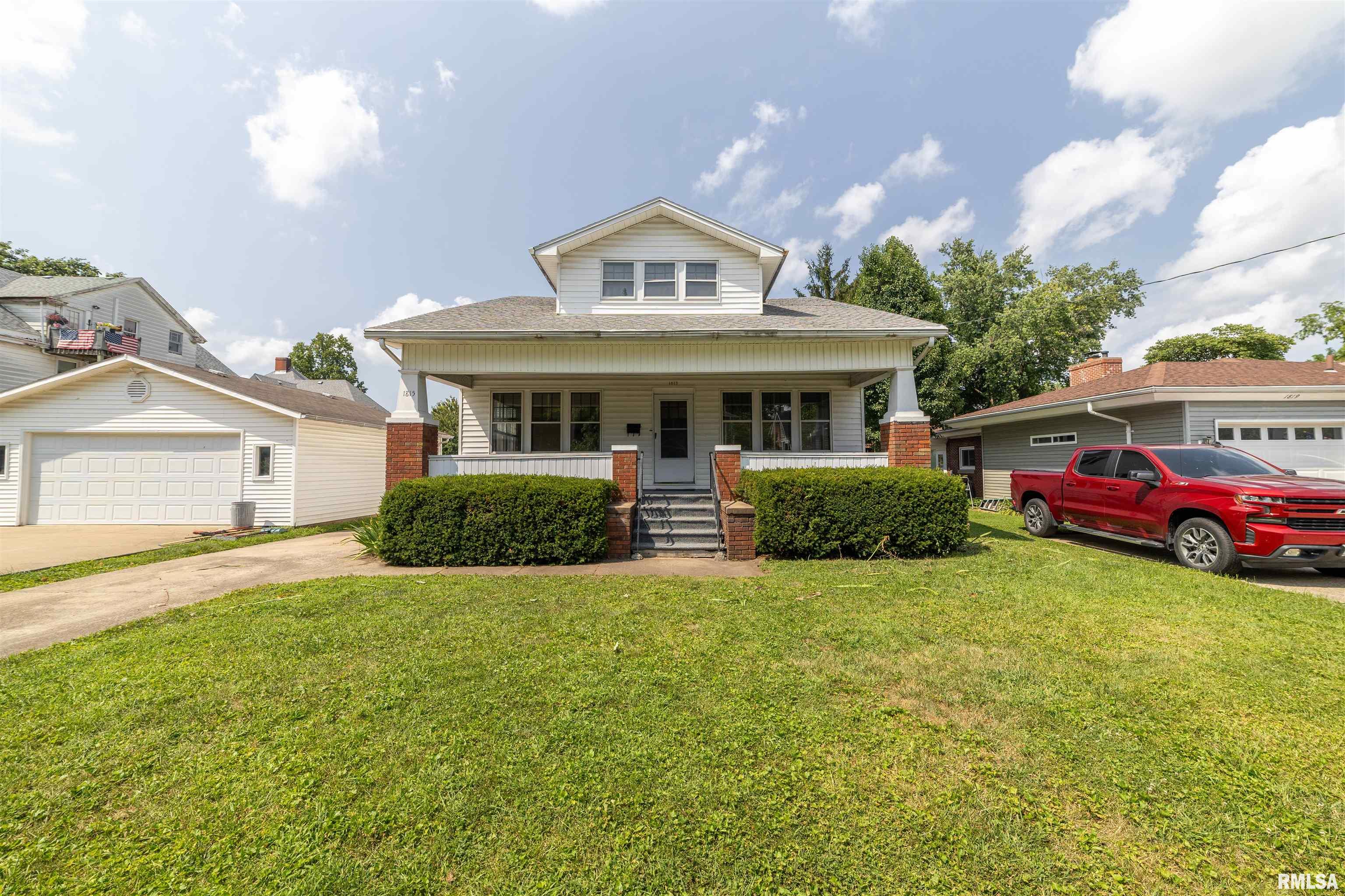 Classic bungalow full of charm and character. This 3-bedroom, 2-bath home features original hardwood floors, an updated kitchen, and spacious living areas filled with timeless appeal. The full basement offers excellent storage and additional workspace, while the unfinished attic presents a fantastic opportunity to create additional living space, bedrooms, a home office, or a bonus room. This property also offers a 2 car garage as well as in inviting covered front porch for relaxing.
