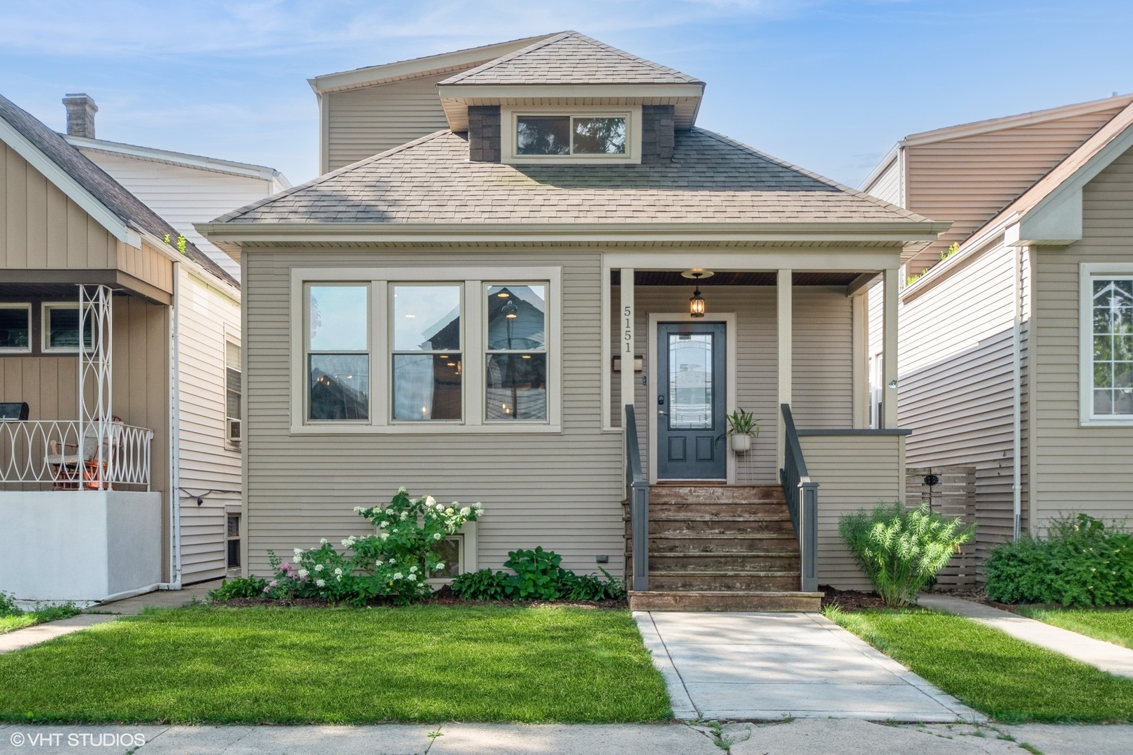 Welcome to this exquisite agent-owned residence located in the heart of Jefferson Park. This spacious home offers 5 bedrooms and 3 full bathrooms, perfectly accommodating family living and entertaining. As you step through the foyer, you're greeted by beautiful hardwood floors that flow seamlessly into the open-concept living, dining, and kitchen areas.    The main level features a convenient bedroom and a mudroom that leads to an outdoor oasis. Step down four steps to a hot tub and an expansive multi-level backyard adorned with exotic Brazillian Ipe wood decking. The yard is designed with built-in planters, a privacy screen, and an 8-person hot tub for ultimate relaxation. Enjoy gatherings on the concrete stamped patio, complete with high-end astro turf and a concrete & cedar built-in grilling station.    Venture upstairs to find two bedrooms, each boasting double closets and elegant herringbone wood flooring. The primary bedroom is a serene retreat, and both bedrooms share a luxurious bathroom with a Jacuzzi tub. The first level's bathroom is adorned with custom wallpaper, a high-end vanity, Restoration Hardware finishes, rain shower and a soaking tub.    Descend to the basement via wooden stairs where a beautifully poured concrete floor welcomes you. This area is designed for versatility and features a custom-designed bathroom with TALA lighting fixtures, a walk-in shower with pebble stone tile, and Kohler smart shower finishes. Built-in shelving adds both convenience and style. The basement also houses a large laundry room with a full-size washer and dryer, two additional bedrooms, one with custom built-ins and the other with a walk-in master closet, and a family room featuring a shiplap encased electric fireplace complete with a wall of built-ins providing ample storage and display options.    Every light in the home is equipped with dimmer switches for customizable ambiance, and the dual-zoned HVAC system is managed by two Nest smart thermostats, ensuring comfort and efficiency throughout the year.    Situated in the prestigious Beubien Elementary School and Taft High School District, this home is an extraordinary blend of comfort and sophistication, with distinctive charm throughout its landscape. Don't miss the opportunity to own this exceptional property in Jefferson Park.