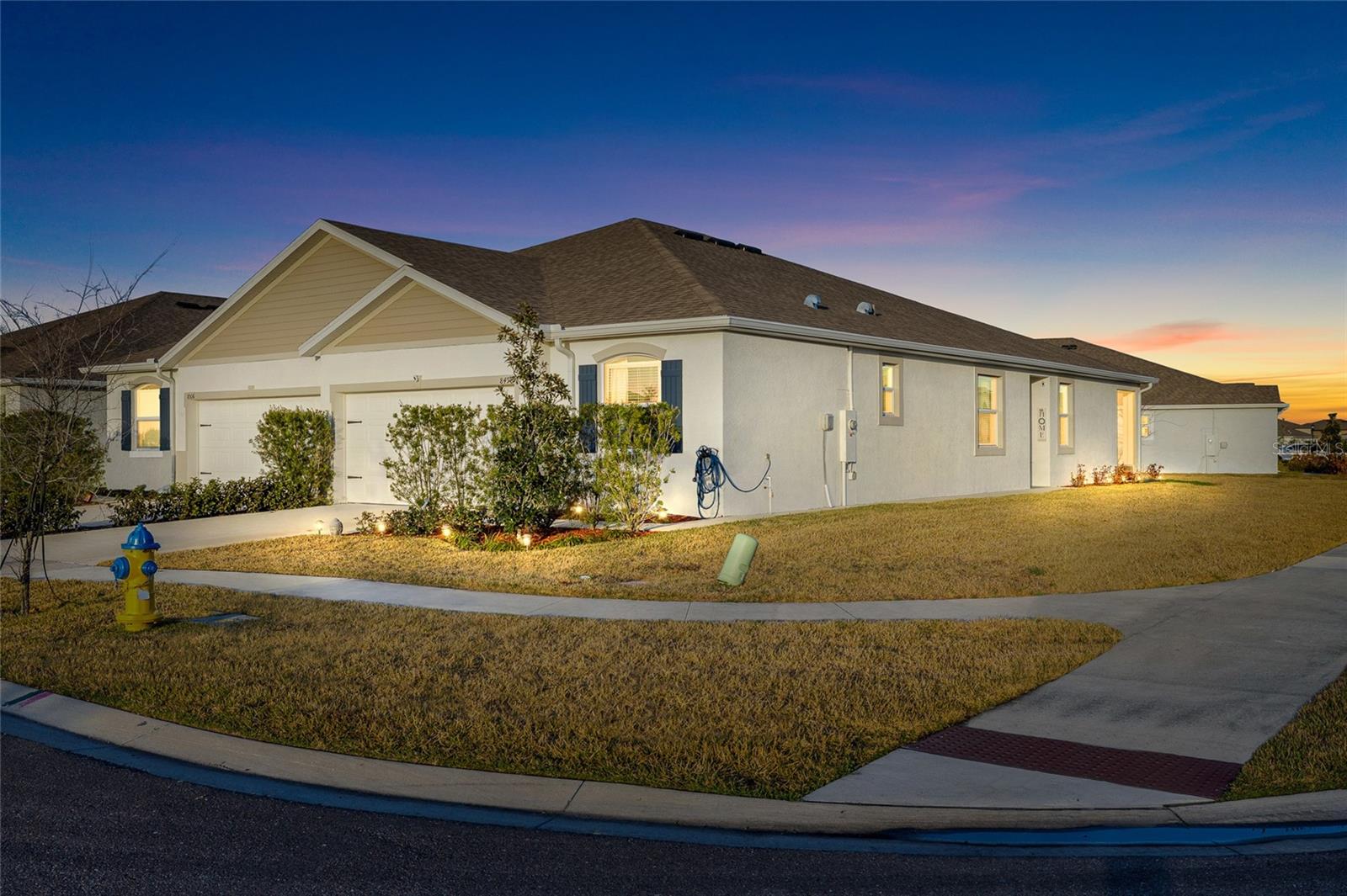 Located in Towns at Wooddale in Wesley Chapel, this move-in-ready 3 Bedrooms, 2 Bathrooms and 2 car garage home offers a bright, open floor plan with tile flooring in main living areas and a functional split bedroom layout. The spacious living area flows into a modern kitchen featuring a large center island, stainless steel appliances, and ample cabinetry, ideal for everyday living and entertaining. Enjoy peaceful pond views from the covered and screened lanai, creating a relaxing outdoor space to unwind. Community amenities include Clubhouse, Dog park, Golfcarts ok Playground, a pool and cabana. Conveniently located near shopping centers, Malls, restaurants, A+ schools. It's situated with quick access to I-75, and in a prime location of the booming city, which was recently named by the North Tampa Bay Chambers of Commerce as the region’s most desirable location in the Tampa suburbs.