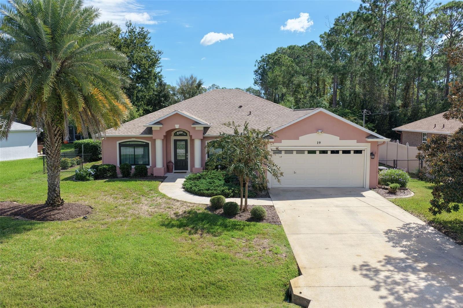 YOUR FLORIDA PARADISE AWAITS IN CYPRESS KNOLL! Discover the perfect combination of comfort, charm, and Florida living in this inviting 4-bedroom, 2-bath pool home with a 2-car garage, located in Palm Coast's desirable Cypress Knoll golf community.Step inside and appreciate the soaring vaulted ceilings, abundant natural light, and spacious open floor plan designed for both everyday living and entertaining. The updated kitchen features granite countertops, wood cabinetry, stainless steel appliances, and a generous breakfast bar overlooking the main living area. There's plenty of room for everyone to gather!The primary suite offers a relaxing retreat with a beautifully remodeled ensuite bath, featuring dual vanities and a spacious walk-in shower. Three additional bedrooms provide flexibility for family, guests, a home office, or a fitness space.HERE'S WHERE THE FLORIDA FUN BEGINS! Step outside to your private backyard oasis, complete with a sparkling pool, expansive screened enclosure, and an exceptionally spacious covered lanai. Whether hosting weekend barbecues, enjoying a refreshing swim, or relaxing in the shade, this outdoor setting was made for making memories. An included pool safety gate adds peace of mind.The fenced backyard offers additional space to enjoy, along with a charming "She Shed" perfect for hobbies, crafts, or your own personal hideaway.Recent improvements include exterior painting (2026), a newly dug irrigation well (2026), and a NEW A/C system 10/2026, Newer Roof 2017Enjoy the appeal of living in the Cypress Knoll golf community, conveniently located near shopping, dining, parks, and Palm Coast's beautiful beaches.Your poolside Florida lifestyle is calling—come see what makes this home special!