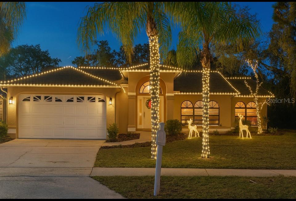 One or more photo(s) has been virtually staged. WHAT COULD BE BETTER THAN A NEW HOME FOR THE HOLIDAYS! This newly remodeled residence provides turn key convenience, featuring a brand new kitchen, interior paint, LVP flooring, and updated fixtures throughout. Upon entry, the spacious living room adjoins a dinette area with views of the modern kitchen. The kitchen is equipped with soft-close cabinetry, granite countertops, a farmhouse sink, and upgraded stainless steel appliances. The primary suite offers an updated bathroom complete with dual sinks and a walk-in shower. Two additional bedrooms are situated on the opposite side of the home near a renovated guest bathroom with a tub/shower combination and access door to the pool for convenience. The screened, covered porch overlooks the swimming pool and a massive, fully fenced backyard. Located in Arlington Woods Subdivision, the property is convenient to local restaurants, shopping venues, and easy access to US 19 and Veterans Pkwy. Flood insurance is not required and the home has no history of flooding.