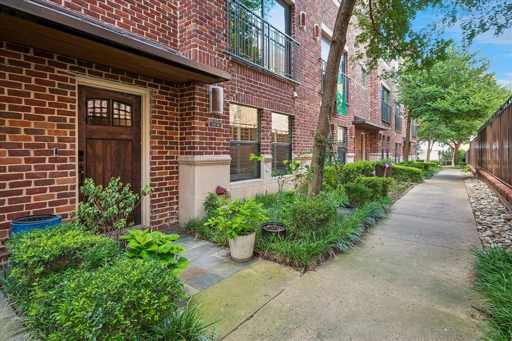 Sophisticated style meets exceptional craftsmanship in this beautifully updated three-story townhome in the heart of Uptown’s coveted State Thomas neighborhood. Bathed in natural light, the open-concept floor plan seamlessly connects the living, dining, and gourmet kitchen, creating an ideal setting for everyday living and entertaining. Extensively renovated, kitchen and primary in 2025, with high-end finishes, smart-home technology, and thoughtful upgrades throughout, this is a truly turnkey residence.Upon entry, you’re welcomed by a warm foyer leading to a private first-floor guest suite with an ensuite bath—ideal for visitors or a home office. The second level is the heart of the home, where the renovated kitchen features striking premium natural quartzite waterfall countertops and backsplash, refinished cabinetry, premium appliances, designer lighting, and Kohler fixtures. The adjoining living and dining areas are enhanced by abundant natural light and refined finishes.The third floor is a tranquil primary retreat with a spa-inspired bath featuring floor-to-ceiling polished tile, a soaking tub, oversized shower, and an expansive walk-in closet. A secondary bedroom or office and a conveniently located laundry complete the upper level.The spectacular rooftop terrace features Trex composite decking, a premium outdoor kitchen with a Twin Eagles natural gas grill, integrated audio, designer lighting, and panoramic Dallas skyline views.The home reflects exceptional care with a professionally integrated whole-home entertainment system, smart-home automation, updated LED lighting, fresh paint, premium flooring, enhanced roofing systems, garage improvements, and numerous additional upgrades.Located just steps from Uptown’s acclaimed restaurants, boutique shopping, parks, the Katy Trail, and vibrant nightlife, this exceptional residence offers sophisticated urban living with the convenience of a lock-and-leave lifestyle.