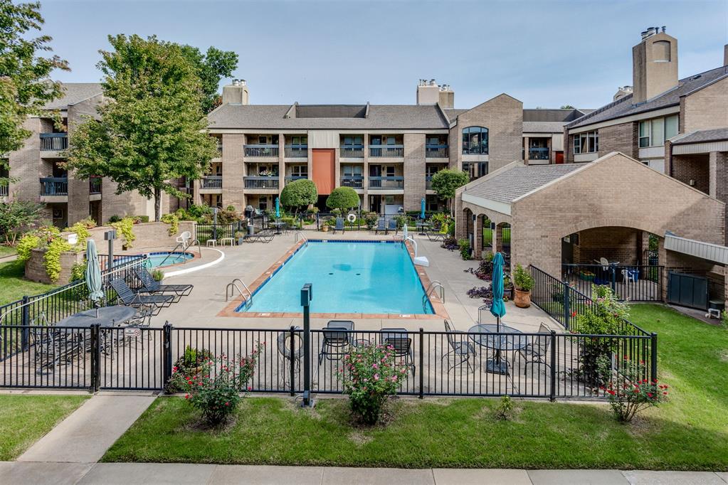 Enjoy comfortable, low-maintenance living in this inviting downtown condominium. The open living and dining area offers a bright, spacious feel with plenty of natural light and a gas-log fireplace that creates a warm focal point for relaxing or entertaining. The kitchen provides generous cabinet and counter space, along with included appliances for added convenience. Both bedrooms offer private bathroom access, making the layout ideal for guests, roommates, a home office, or a flexible second living space. Ample storage throughout the condo helps keep everything organized, while the included washer and dryer make everyday living even easier. Residents can enjoy a variety of community amenities, including gated entry, a fenced swimming pool, hot tub, cabana, outdoor grilling area, and landscaped common spaces. The community offers the convenience of condominium living without sacrificing space, privacy, or access to outdoor amenities. Located near downtown Oklahoma City, this condo provides quick access to restaurants, entertainment, sporting events, museums, parks, and major employment centers. Bricktown, Scissortail Park, Paycom Center, Midtown, and the Civic Center are all just minutes away. Whether you are looking for a primary residence, a convenient downtown retreat, or an investment opportunity, this condo offers an appealing combination of comfort, amenities, and location.