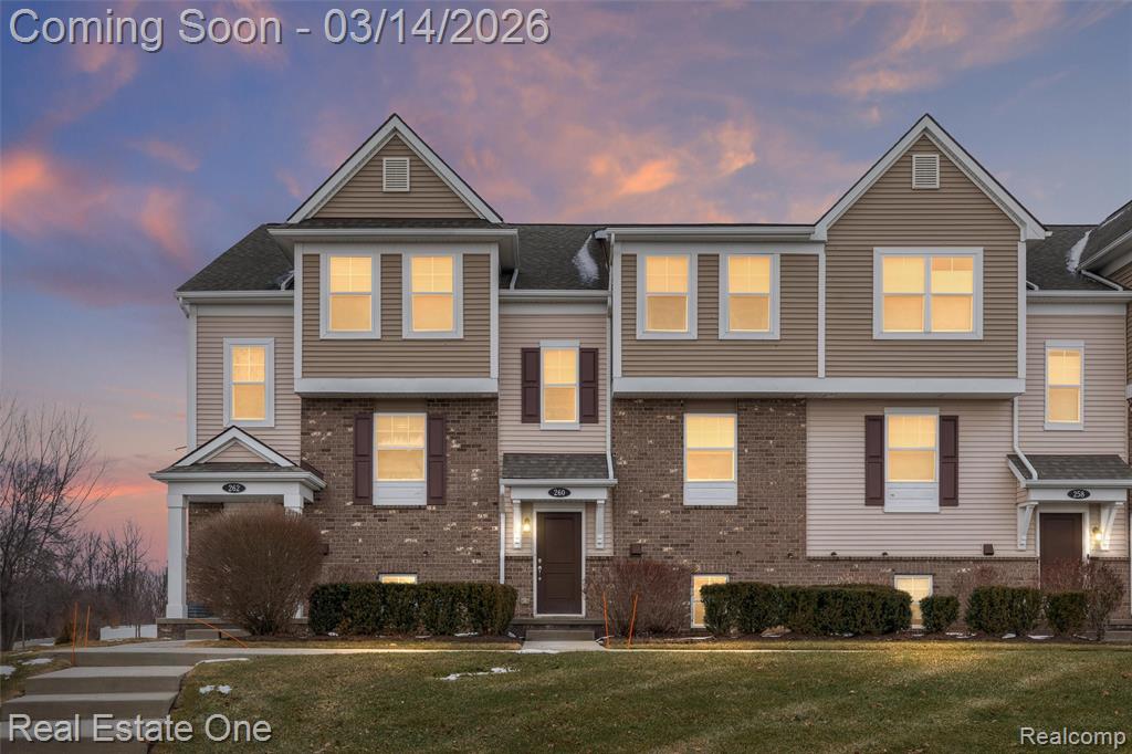 In the heart of Downtown Wixom, this gorgeous townhouse has so much to offer. Two doors away from the Michigan Air Line Trail, and just a short walk to Wixom's restaurants and social district, summer concerts, fireworks, parks, and block party, you have access to great amenities and small town charm. The main level of this condo is a bright and open area that combines natural light pouring in through large windows with warm hardwood floors, a large living room with a nook area, a kitchen with modern finishes and an eat-at island, access to the balcony overlooking the trailway, and a half-bath. The primary and secondary suites are located on the top-level, along with a laundry closet. The primary bedroom faces the trailway and green views as well, and features multiple closets, including a walk-in closet. The secondary suite has a full en-suite and walk-in closet as well, with views of the trailway and front-facing green views. The lower level is finished and includes a daylight window to offer the flexibility of an office space, mudroom, or recreation area. The rear-facing, two-car garage offers ample parking, including spaces directly outside the garage too. Let's get your tour scheduled soon!