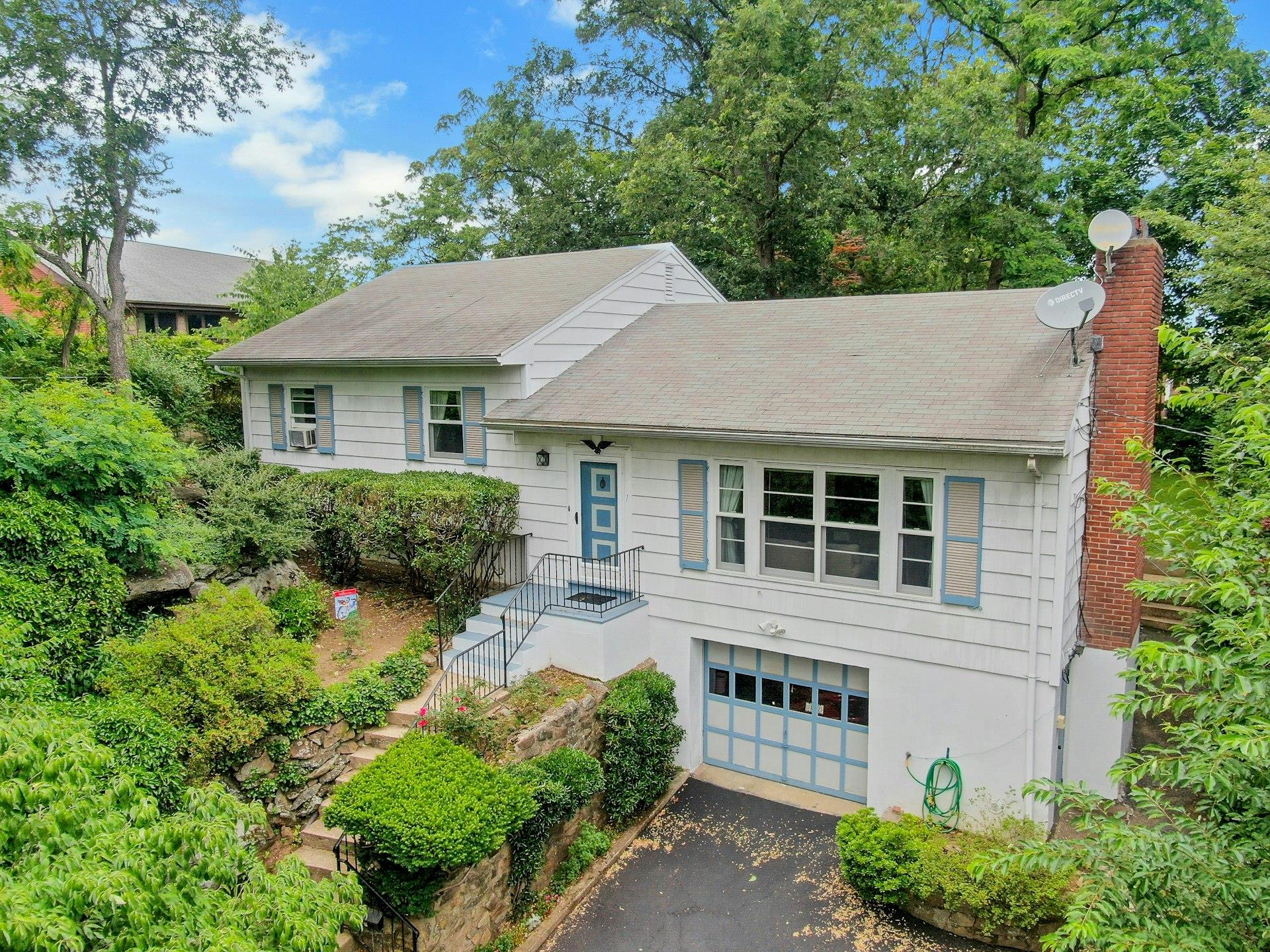 Located at the End of a Quiet, Tree-Lined Street, this Beautiful & Spacious 3-Bedroom Home in the Mamaroneck PO section of Harrison Offers Privacy and Lush Greenery in a Prime Location only Minutes from Shops, Restaurants, Beaches & the Train Station. The 1st Floor Features a Bright, Airy Layout with a Large Updated Eat-in-Kitchen with Granite Countertops & Stainless-Steel Appliances.  The Formal Dining Room transitions seamlessly into the Expansive Living Room with a fireplace where natural light pours through a series of Windows, creating a warm & inviting atmosphere perfect for gatherings.  The upper level includes 3-Bedrooms, a Primary Bedroom with an Ensuite bath, a renovated hall bath, and attic access.  Step outside into the Backyard Oasis, where you can Relax and Unwind Amidst the Lush Greenery and Enjoy the Privacy of the Yard.  Driveway can Accommodate Two Cars in addition to Oversized 1-Car Garage providing additional Parking & Generous Storage Space.  Laundry & Utilities are in the Basement.  Hardwood Flooring Under Carpeting throughout.  Don’t Miss Your Chance to Make this Wonderful Home Your Own enjoying the Conveniences of the Village of Mamaroneck & Harrison with LOW Harrison Taxes! $15,231.  40-Minute commute via train to Manhattan.  Taxes do not include Basic STAR Exemption of $990.00.  ADDITIONAL UPDATES: Above Ground Oil Tank 275 Gal installed 2024; Marvin Windows 2007