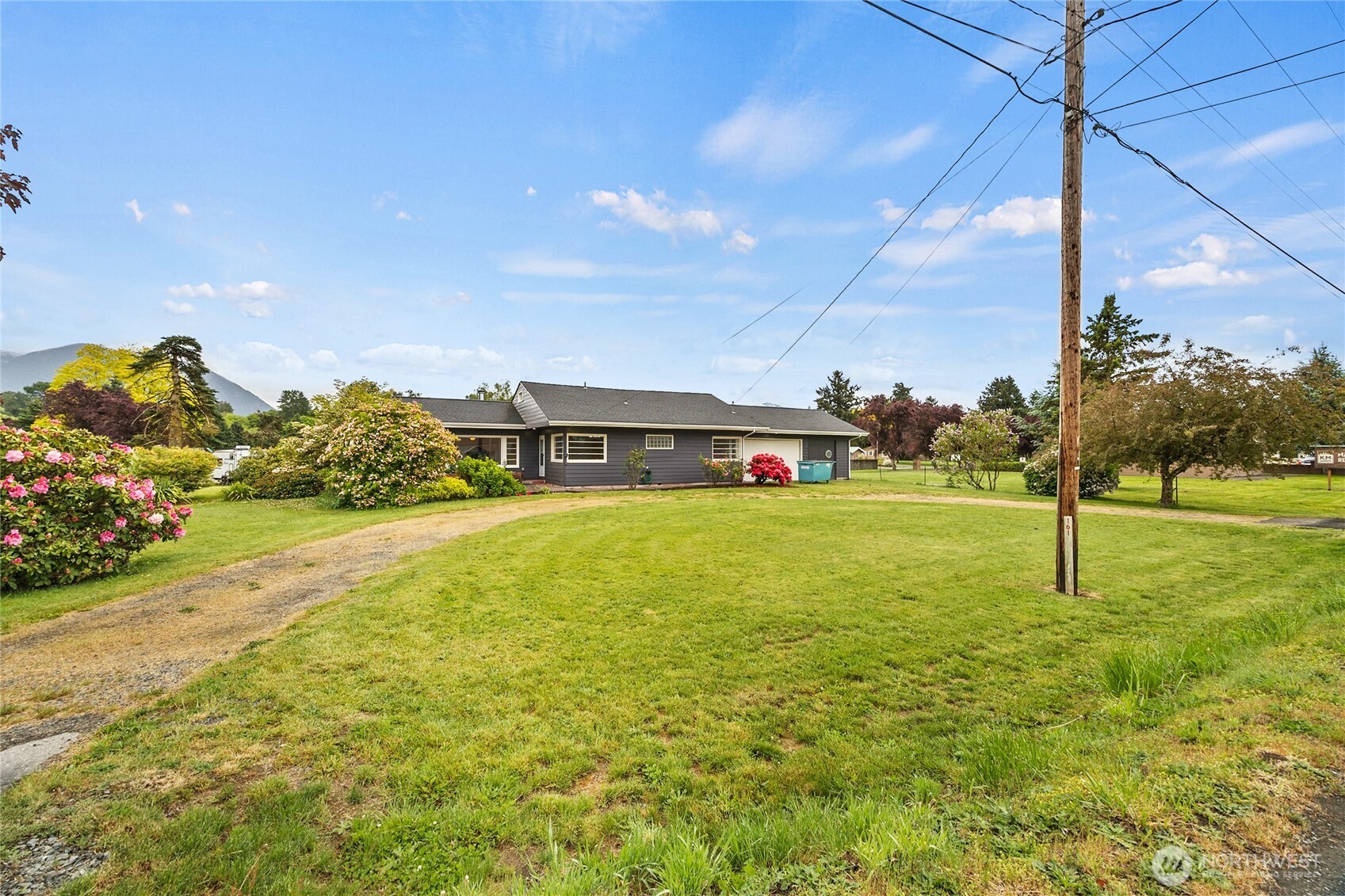 Welcome to peaceful mountain living in the heart of Randle! This charming 1,374 sq ft home offers comfortable living space on a spacious lot with room to garden, entertain, or simply relax and enjoy the beauty of the Pacific Northwest. Nestled between Mt. Rainier and Mt. St. Helens, this property is perfectly positioned for year-round adventure with quick access to White Pass Ski Area, the Gifford Pinchot National Forest, rivers, lakes, hiking, fishing, hunting, and endless outdoor recreation. Whether you're looking for a full-time residence, weekend getaway, or investment opportunity, this home delivers small-town charm with incredible natural surroundings right outside your door.